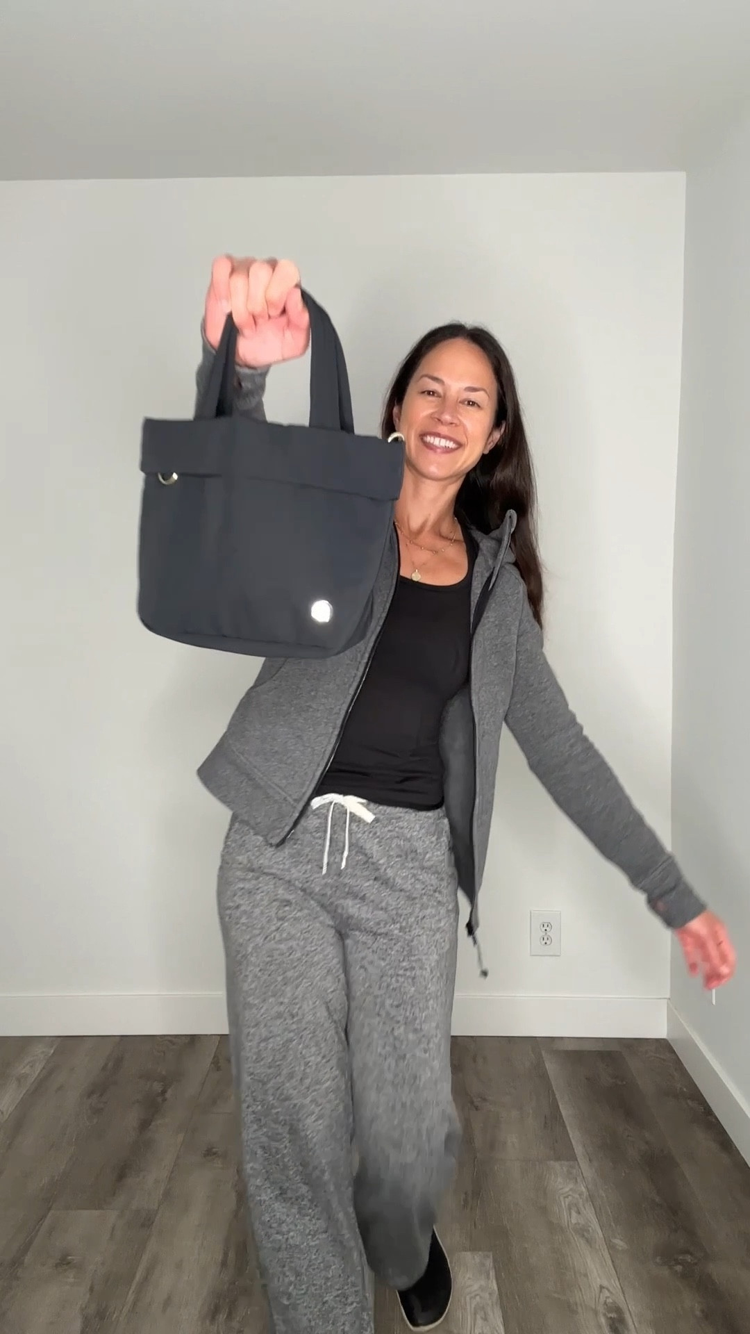 Small but mighty—and seriously cute. 🖤
 I’ve waited years for a functional, minimal, elevated tote like this, and Lululemon finally delivered. The On My Level Small Tote Bag (5L) has officially replaced my purse—I carry it everywhere.

✨ Adjustable + removable crossbody strap for hands-free comfort 👜 Sleek, structured design that elevates any outfit 📏 Comes in multiple sizes—5L (my fave!), 19L, 20L, and 27.5L 🎨 Color options include Black, Light Ivory, and Lavender Frost in select sizes

I’m already eyeing one of the larger sizes to use as my gym bag and travel tote. It’s compact but fits everything I need for daily life, and I love how effortlessly functional it is. Cute, durable, and thoughtfully designed—exactly what I want in a bag.
 #LululemonBag #OnMyLevelTote #LTKStyle #LTKFinds #FunctionalFashion #EverydayTote #MinimalistStyle #LululemonEssentials #LTKTravel #LTKGymBag


#LTKTravel #LTKActive #LTKFindsUnder100