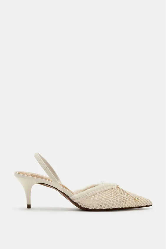 DescriptionCompositionMeasurementsSlingback heels with a bow detail on the front. Features raw-cu... | Zara UK