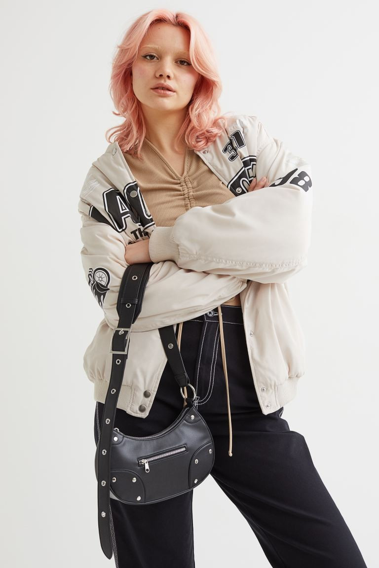 Small bag in imitation leather with studs. Zip at the top, an adjustable shoulder strap with a me... | H&M (UK, MY, IN, SG, PH, TW, HK)