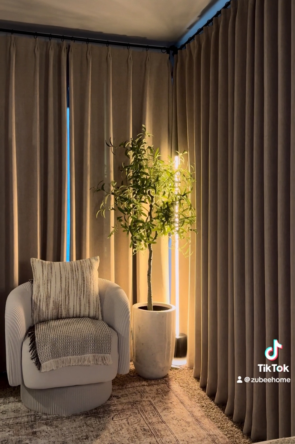 My favorite corner 🛋️🤎✨ #livingroomdecor #accentchair #curtains #lightingg

#LTKHome