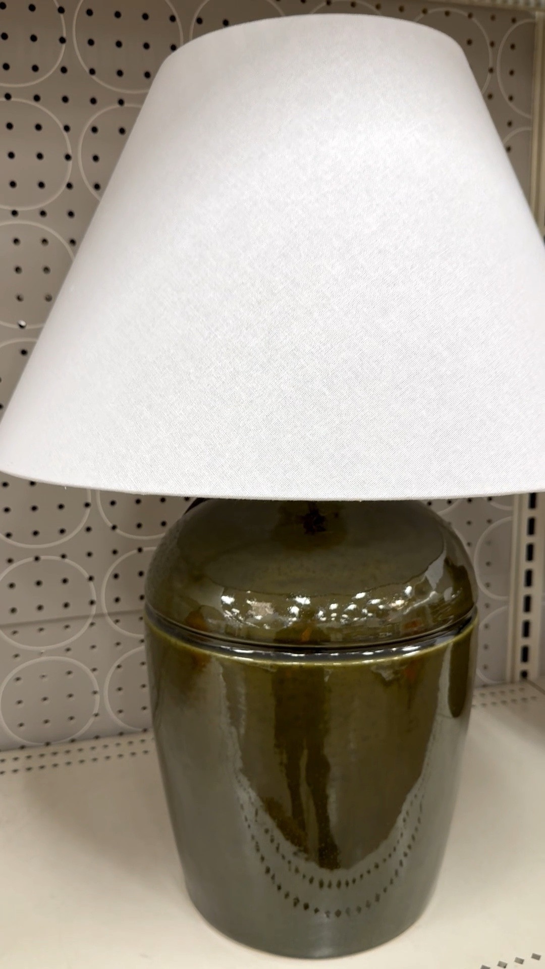 This ceramic table lamp is such a gorgeous green. I’d call it a dressy army or olive green. It’s ‘dressy’ because it has a high gloss shine, and is paired with a crisp empire shade. It’s perfect for an end table, entryway, or reading nook. 

And if you’re a mosaic artist who’s been looking for a lamp base for your artwork, this would make a fun substrate too! For mosaic tips, tutorials + inspiration please visit my YouTube channel: YouTube.com/julieweilbacher. Follow @julieweilbacher on Instagram for all things mosaic art.

#tablelamp #ceramiclamp #greenlamp #lampset #tablelight #target #threshold #studiomcgee #mosaic #sofalight #entrywaytablelight

#LTKFindsUnder100 #LTKHome