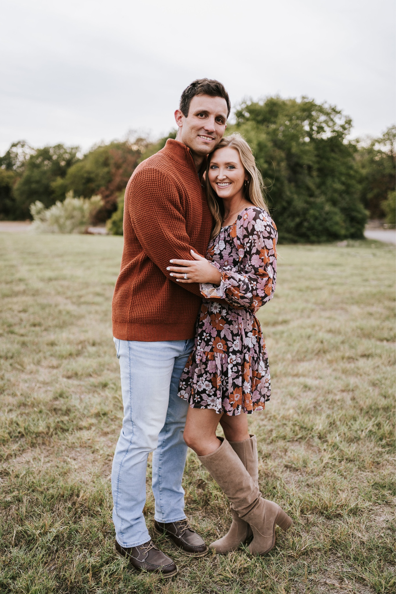 Family pics coordinated outfits, floral fall dress with boots, men’s waffle sweater with boots