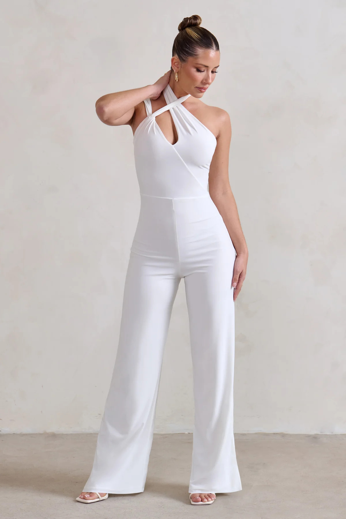 Tilly | White Cut Out Halterneck Asymmetrical Jumpsuit | Club L London