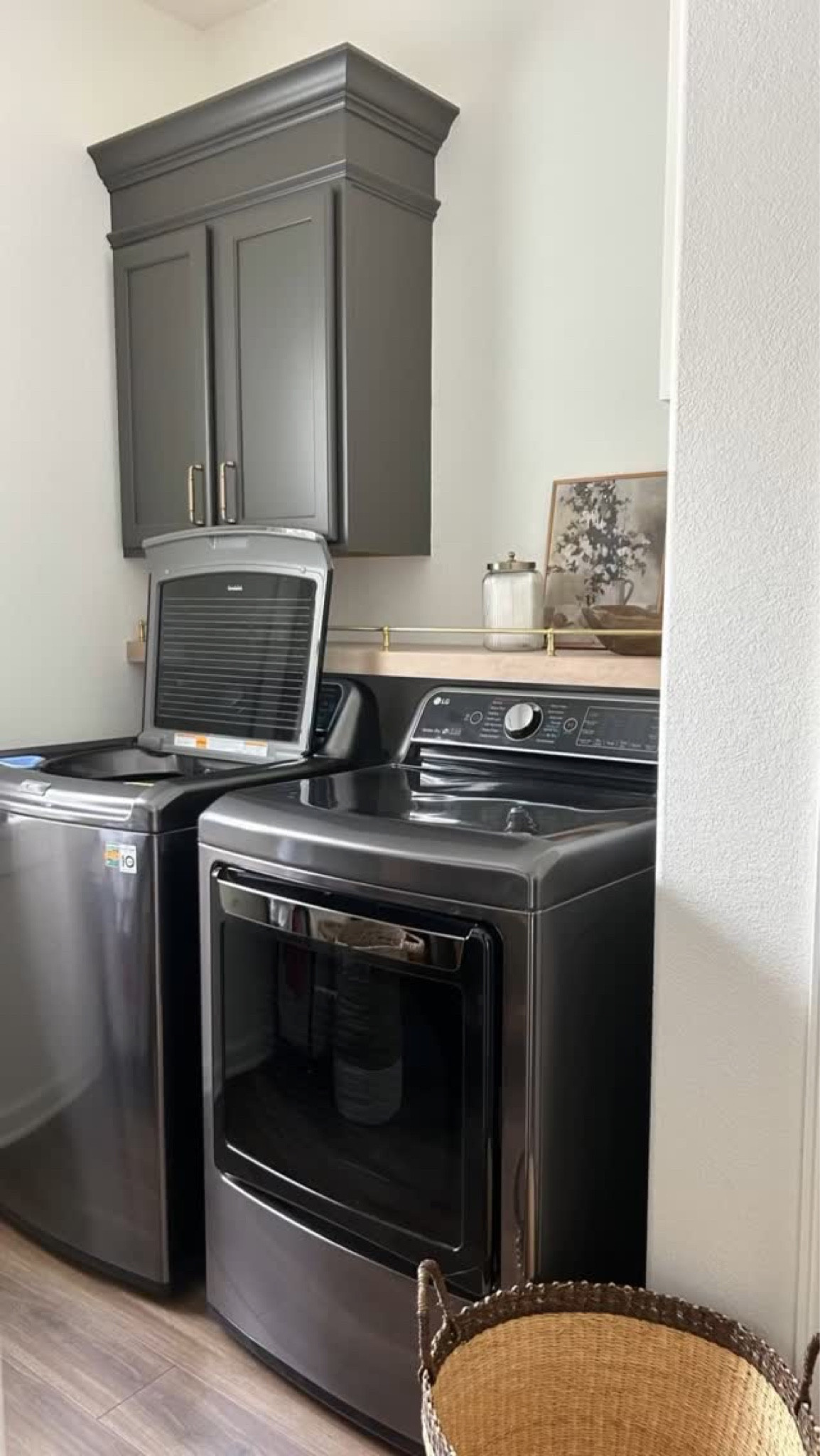 Having a top load washer made me think we wouldn’t be able to add a shelf above it…but we figured it out!

Adding a shelf made this space a bit more functional (as I am only 5’0” so reaching into the cabinet above the washer isn’t the easiest) and added some warmth/texture. 

We personally love it and are happy we took the time to figure out how to make it work for us!

#fauxfloatingshelf #laundryroom #shelf #brassrail #laundryroomshelf #diyproject

#liketkit
@liketk.it
Laundry room
Shelf
Rail
Brass rail
Tipping rail


#LTKFindsUnder100 #LTKWatchNow #LTKHome