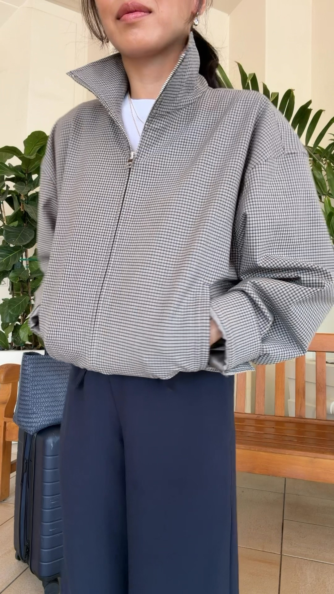 Size info below! 
• plaid bomber jacket 2XS great quality, oversized fit on me with sleeves folded up. Banded bottom torso can be tucked under for a shorter look. 
• Aritzia pants 2XS short FYI runs long for petites so you may need to hem to wear with sneakers (I have sneaker inserts in), I have also purchased regular sizing and hem them. 
• lululemon T-Shirt xxs this is a cropped length, also linked a high quality non cropped tee I love. 
• Madewell tote 
• Polo hat 
• Away bigger flex carry-on suitcase 
• new balance 530 sneakers 

Vacation travel outfit, airport style, comfy petite mom, easy chic ideas

#LTKTravel #LTKPetite #LTKmomlife