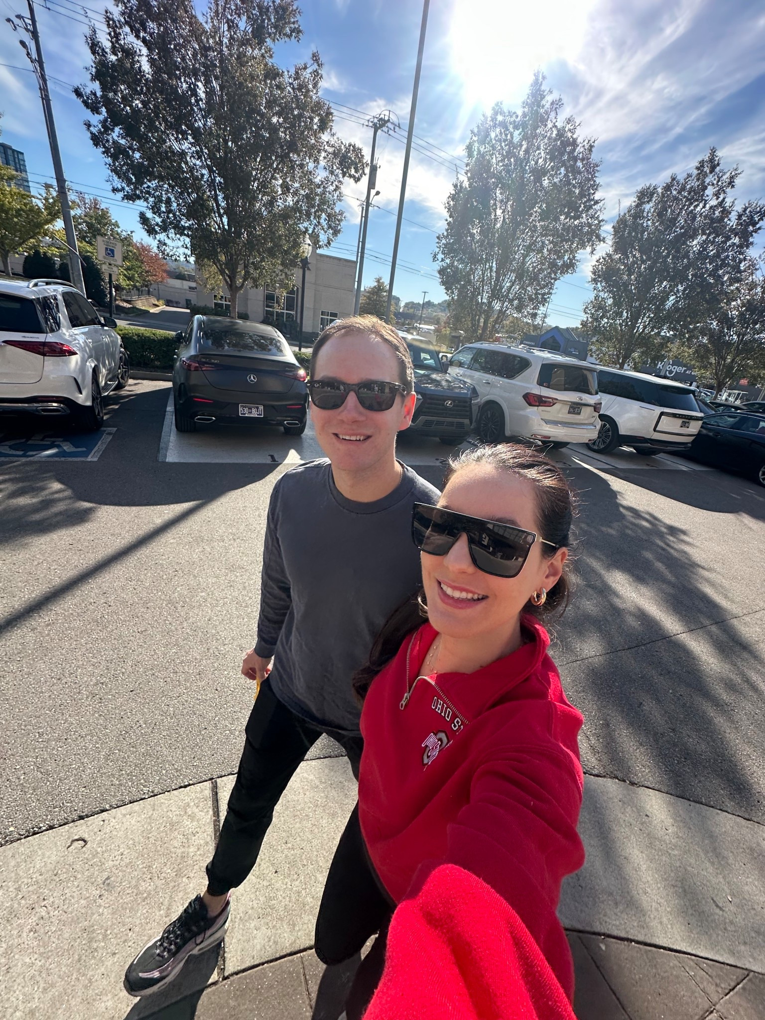 Quay sunglasses
Ettika gold hoop earrings 
Ohio State sweatshirt 
