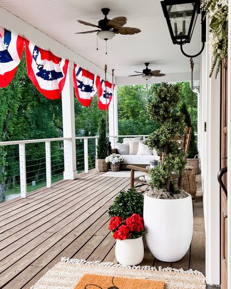 Front porch and front door home decor, modern farmhouse, style, classic white traditional transitional, layered jute, scatter rug and doormat outdoor decor, home accents and accessories. Large white planter spiral topiary boxwood tree outdoor table, faux artificial florals, geraniums, hydrangeas  plants and trees, outdoor wall Sconce lantern, lighting, light fixtures, spring, and summer wreaths. American flag bunting, patriotic, decor, red flowers memorial day, Fourth of July, Independence Day, holiday home, decor

#LTKFind #LTKhome #LTKSeasonal