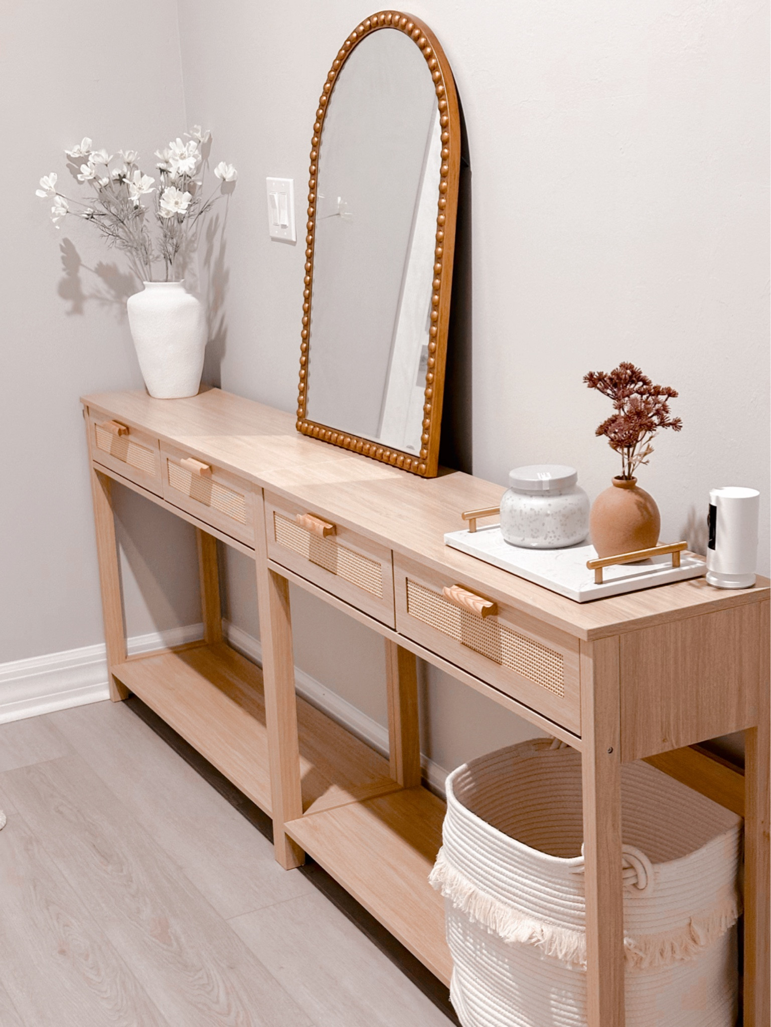 My entryway decor


White base, gold mirror, candle, flowers, marble tray , boho basket

#LTKFindsUnder100 #LTKHome