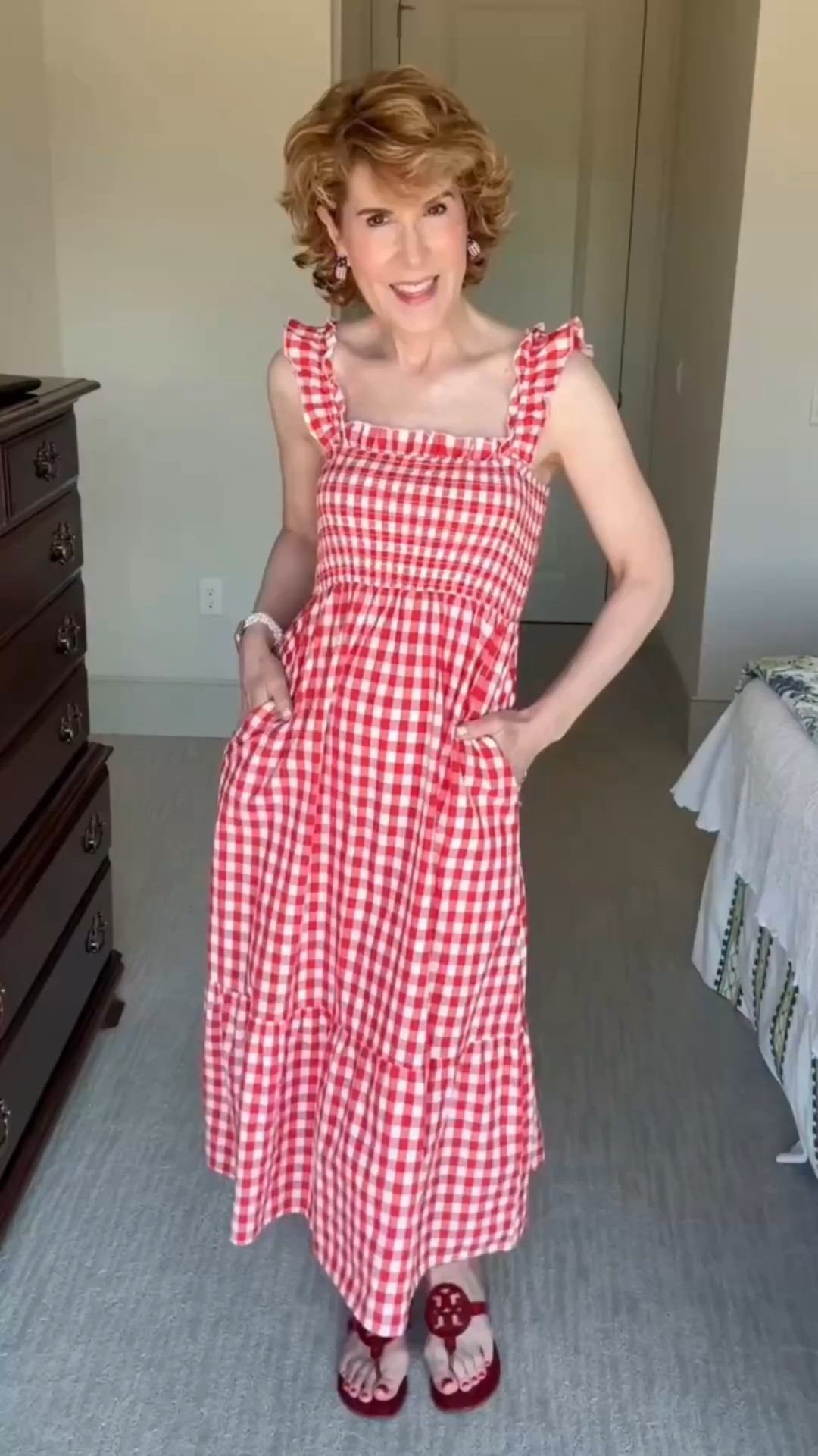 Because it’s the Fourth of July weekend, I couldn’t resist a little party in the picnic print.
❤️🤍❤️🤍
This red gingham smocked midi dress is a classic summer style that’s perfect for the Fourth of July, vacations, picnics, brunch, and casual summer events. It features a flattering smocked bodice, feminine ruffle straps, a square neckline, flowy tiered skirt, convenient pockets, and a below-the-knee length. Available in four colors: red, blue, black, and khaki.

#LTKootd #LTKTravel #LTKOver40