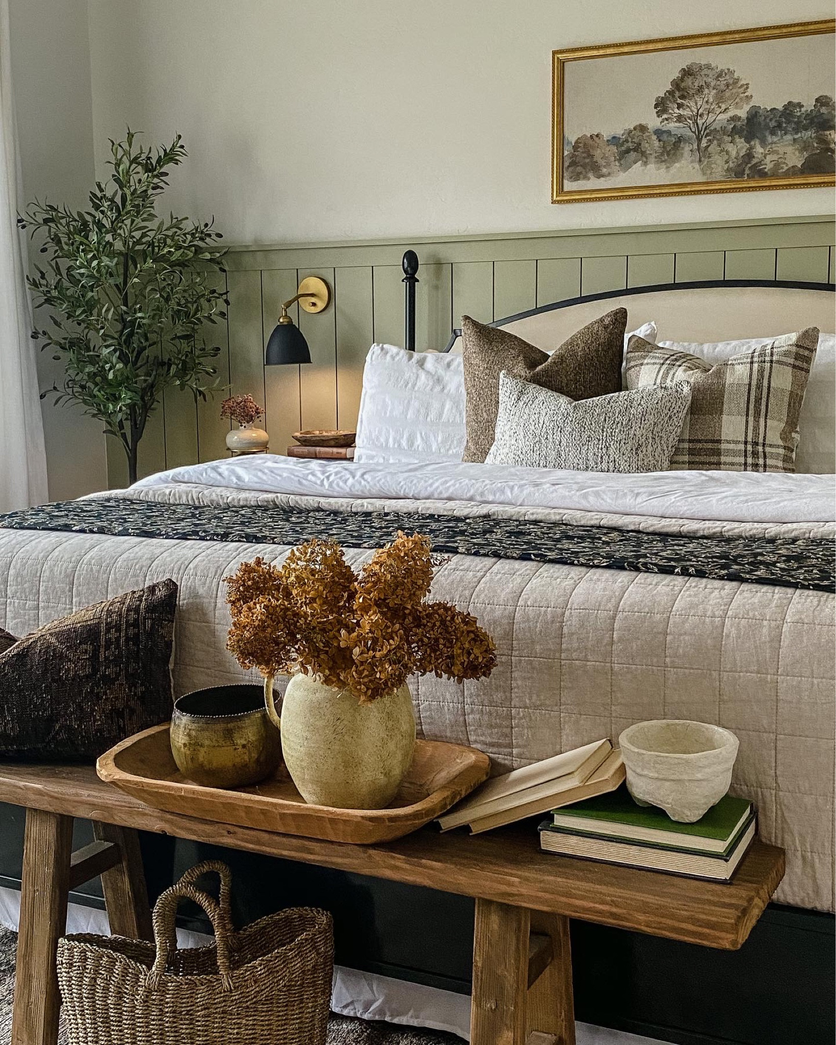 Throw pillows, noodle bench, wooden bench, olive tree, black sconces, dried hydrangeas, vintage art, vintage bedroom, black bed frame, black nightstand, 

#LTKFind #LTKhome #LTKstyletip