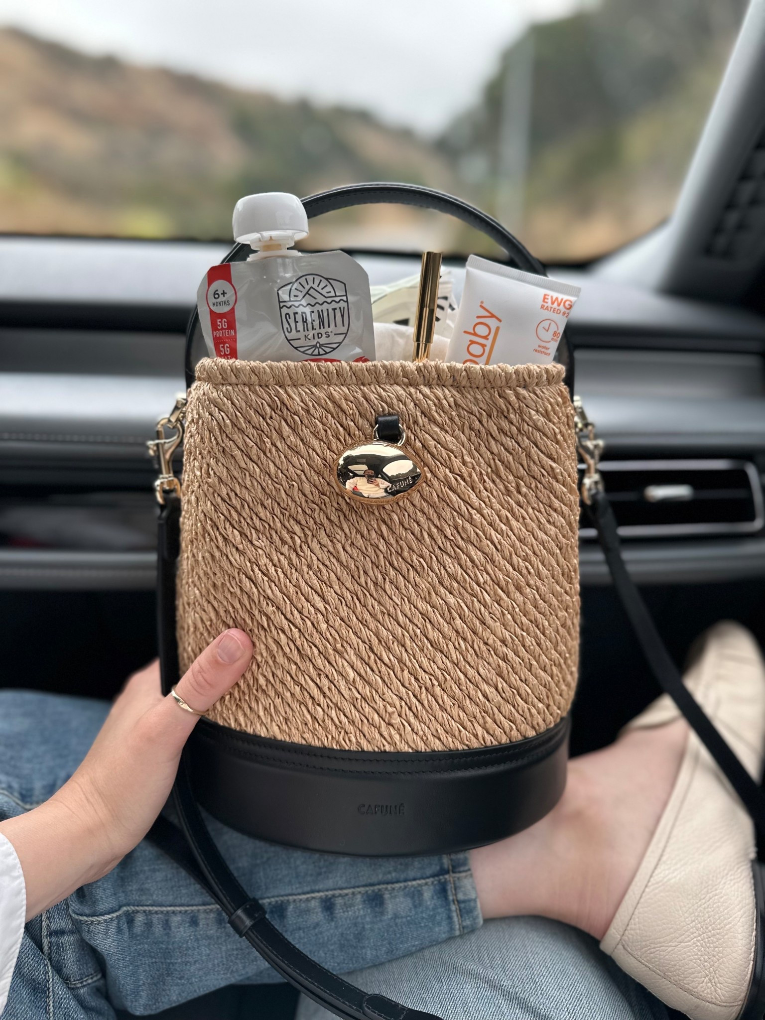 Only the essentials: honest wipes, diapers, organic baby food, and my must-have Merit creamy lipliner in Beverly Hills and nontoxic thinkbaby sunscreen 🤍