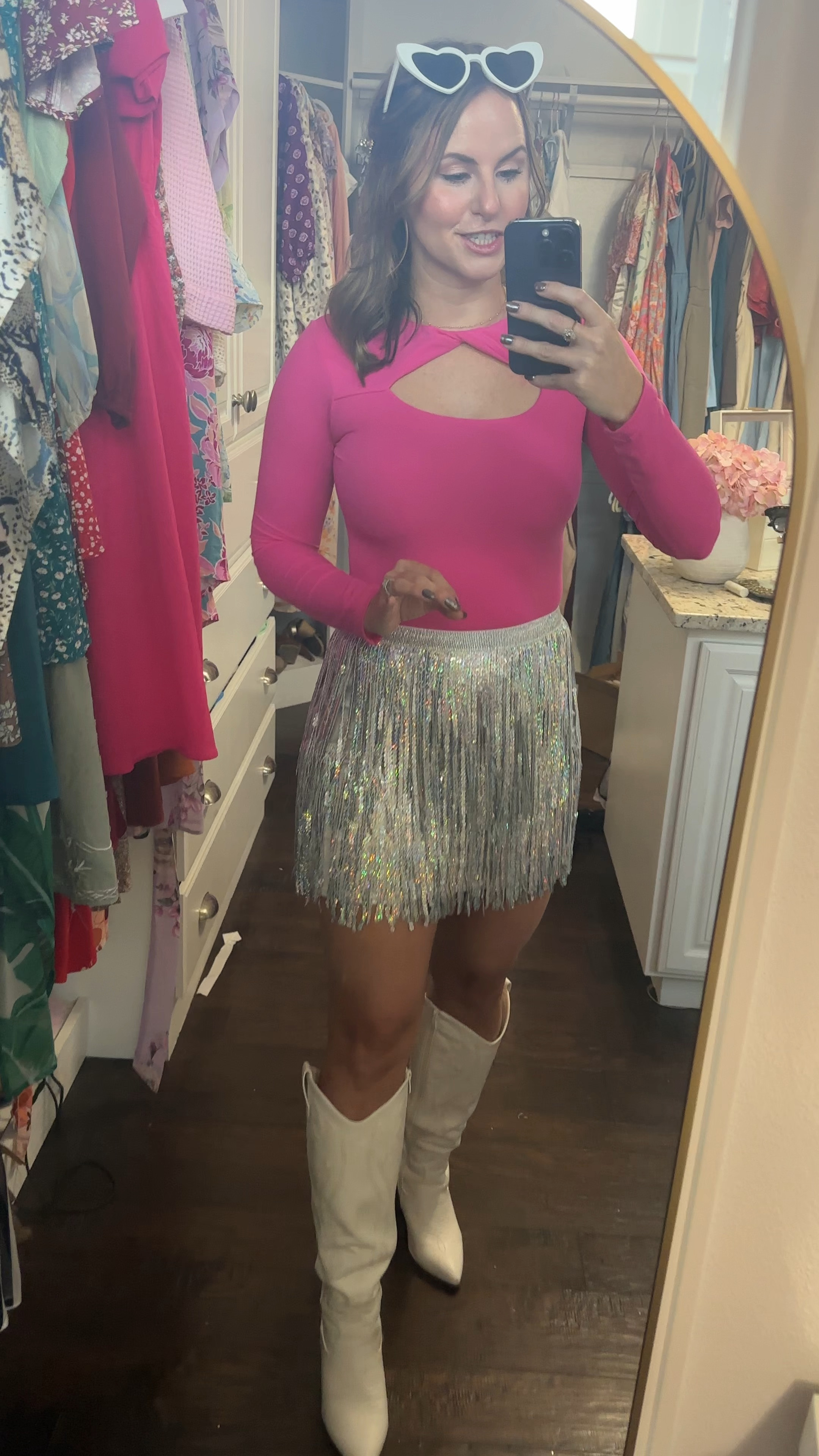 Fun concert outfit, party dress or Vegas outfit! This sequin fringe skirt is SO adorable! It’s stretchy and also has a zipper in the back. It’s high waisted and has elastic waist band. Paired it with this black top that gives the look of a bodysuit, white cowboy boots, heart sunglasses & sparkly hair clips. 

Wearing a size M in all. 


Eras tour outfit, Meghan trainor concert outfit, Taylor swift outfit , Halloween costume, fall outfit, Las Vegas dress , fringe skirt, hot plink bodysuit 

⬇ https://liketk.it/4TEuj #ltkstyletip #ltkfindsunder50 

#LTKStyleTip #LTKVideo #LTKFindsUnder50