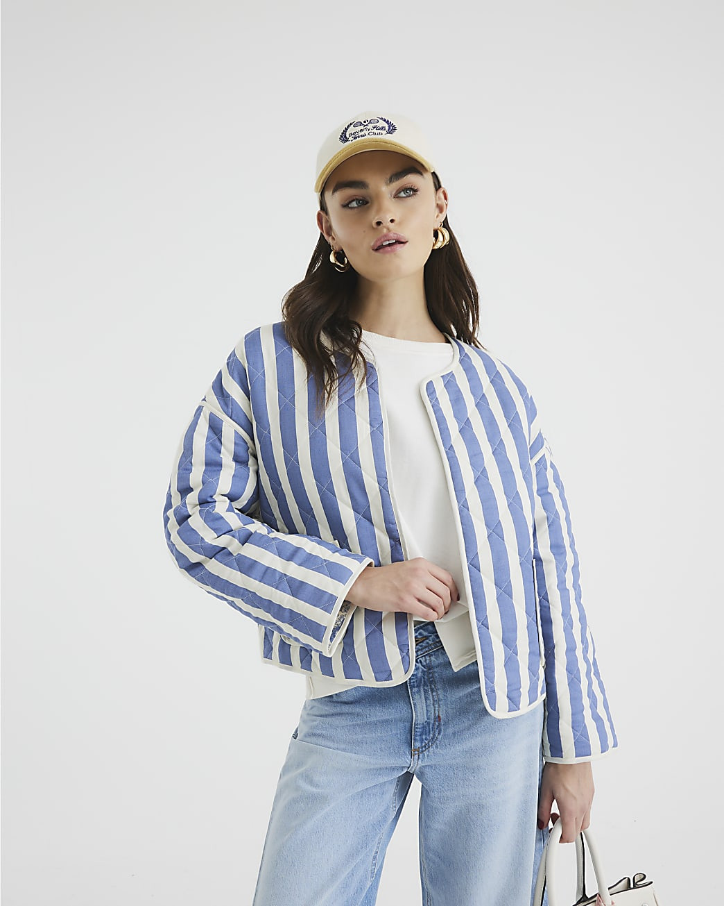 Blue Floral Stripe Reversible Quilted Jacket | River Island UK & IE