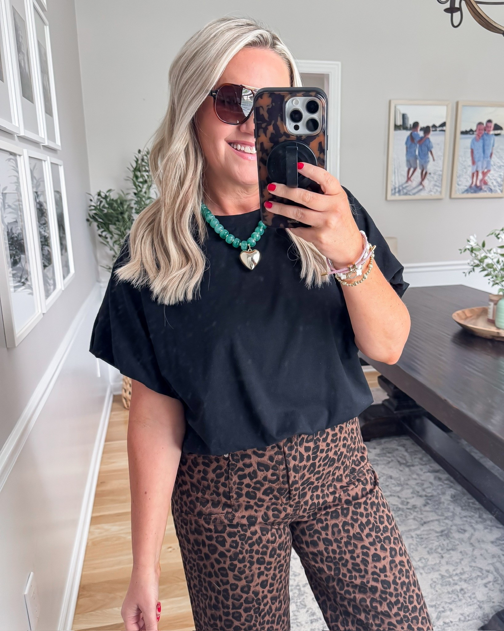 This black tee and leopard pants combo is such a fun mix of neutral basics with a little personality. I love how the statement pants and bold accessories make this feel elevated while still being an easy everyday outfit.

leopard print pants, black tee outfit, casual chic style, statement outfit, everyday fashion, elevated basics, trendy outfit inspiration, wide leg pants, casual style, lovelylifestyling

#LTKSeasonal #LTKOver40 #LTKootd