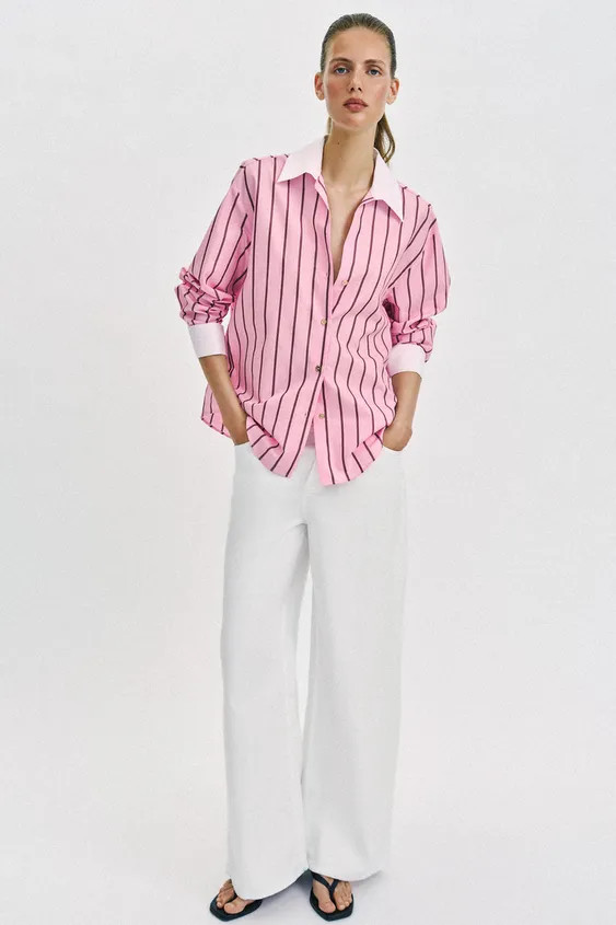 Loose-fitting poplin collared shirt with a v-neck and long sleeves with turn-up contrast cuffs. B... | Zara UK