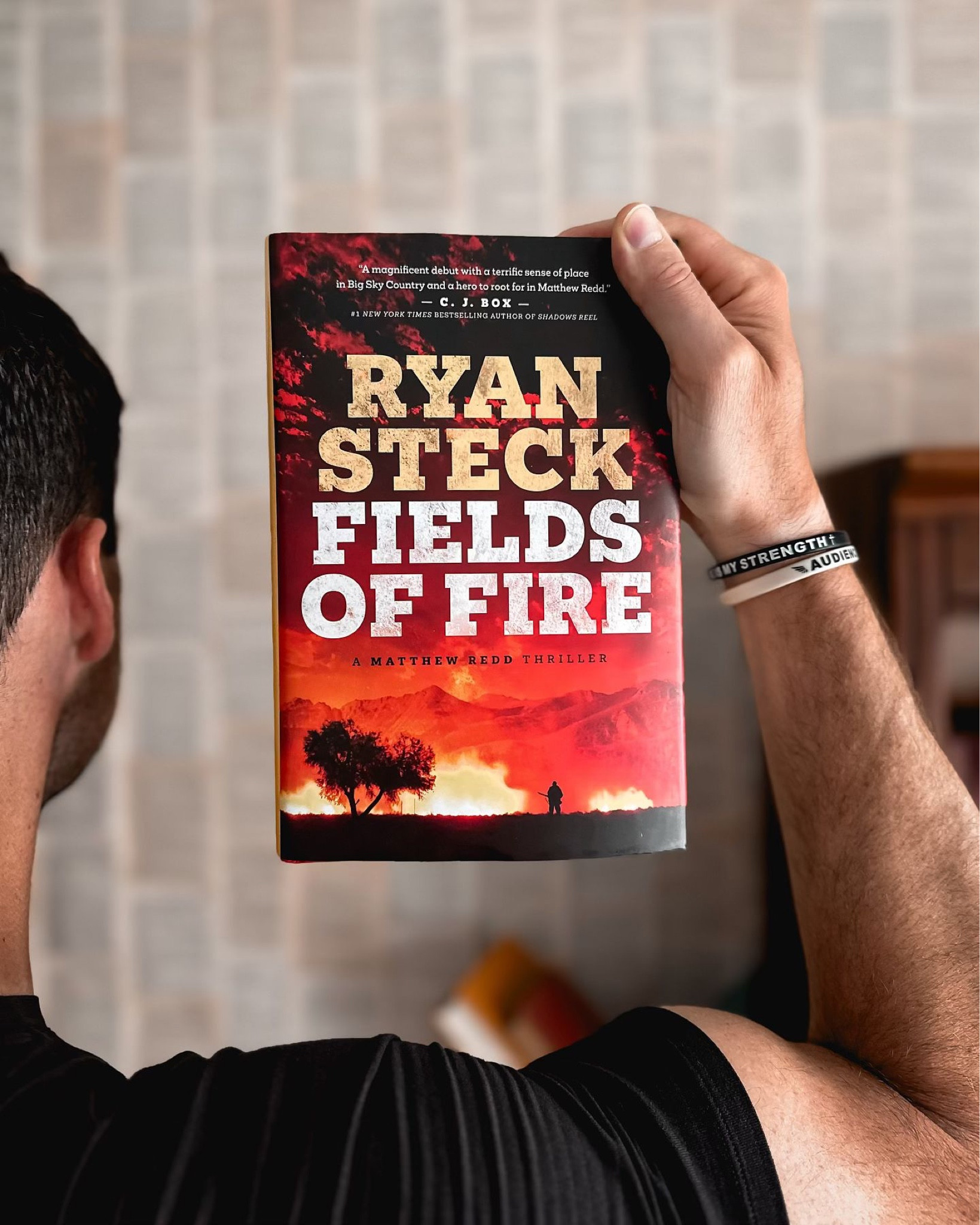 📚💪🏼 Books and Biceps Review: Fields of Fire by Ryan Steck 💪🏼📚 

Hello beautiful friends of HDD. Hope you’re all having a great summer. I had been in a reading rut after finishing Empire of the Damned. (I blame Jay Kristoff for that… if he wasn’t such a talented writer. Anyways, I digress.) After finishing EoTD, I picked up one of Lee Child’s Jack Reacher books that I had started years ago but had not finished. I slugged through the book (it’s never easy to pick up 3/4s of the way through and still be excited about a book, but we were watching the second season of Reacher on Prime so I trodded along). Once done, I was looking for suggestions on a new series. Mindlessly scrolling X before bed one night, I came across a recommendation from one of the accounts I follow, thus I looked into the Matthew Redd series by Ryan Steck. I am so glad I did. As you may know from some of my other reviews, I am a huge fan of the James Reece, Mitch Rapp, and Scot Harvath series, so I was looking for something similar in nature. 

Fields of Fire, the first Matthew Redd book, is an action packed, high octane masterpiece worthy of mention among the list above. When I told my wife I found a series which was also on sale on Amazon, I figured I’d have reading material for weeks. I was wrong, and pleasantly surprised. I finished Fields of Fire within days and have already finished Lethal Range, the second book in the series. Fortunately the third book released in June so I had reading material as we were in the hospital (we both did some reading while we were waiting for the induction to do its thing) and now, as we transition the new normal with our bundle of joy. 

#bookstagram #booksandbiceps #bookrecommendations #bookreview #bookthoughts #actionbooks #thrillerbooks #menwhoread