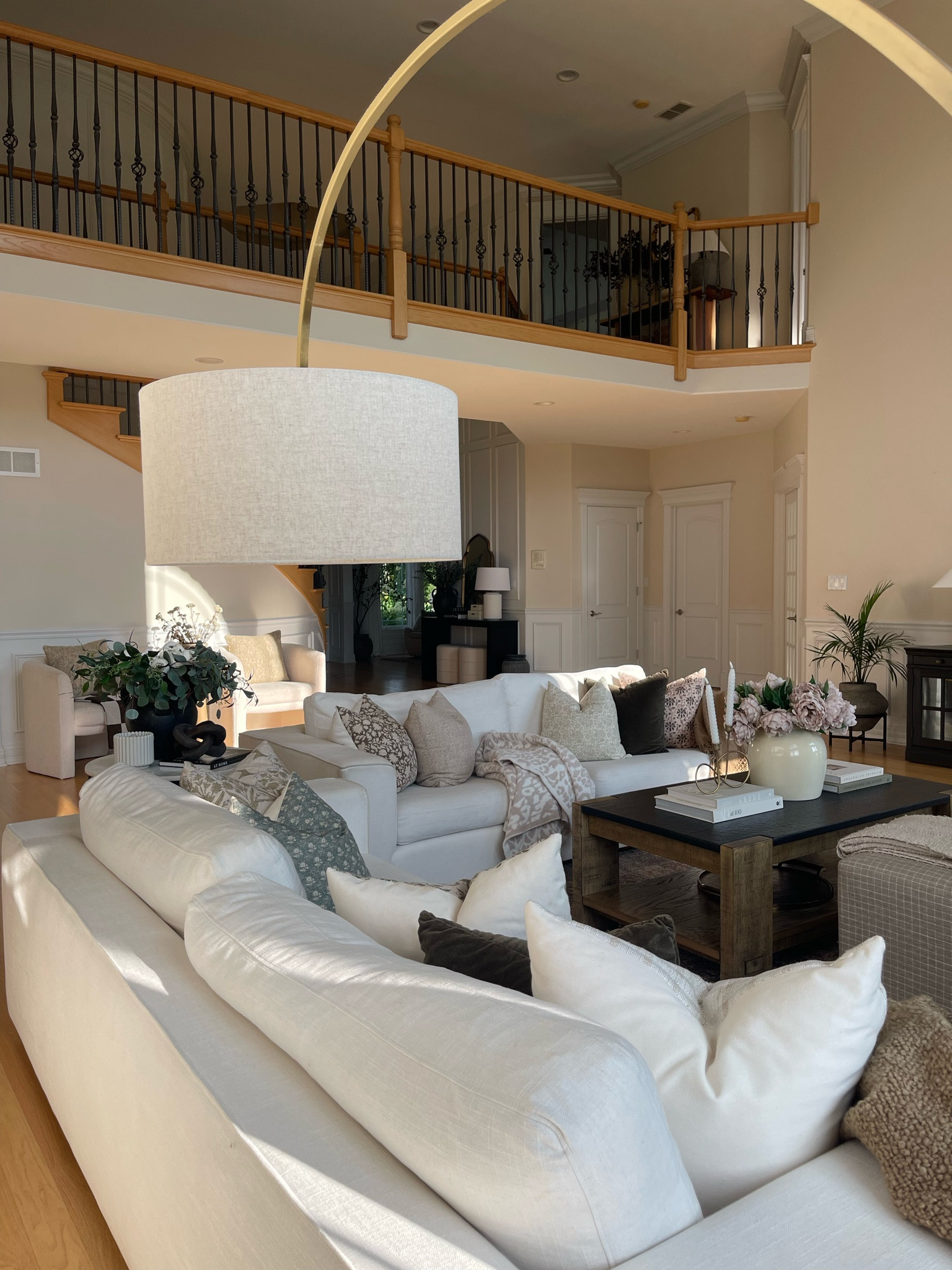 Great room views! This arched lamp is one of my fave purchases and my pillow covers are an obsession! 

Living room, family room, great room, rug, sofa, coffee table, throw pillow, pillows, throw blanket, lamp, floors, 

#LTKstyletip #LTKhome #LTKsalealert