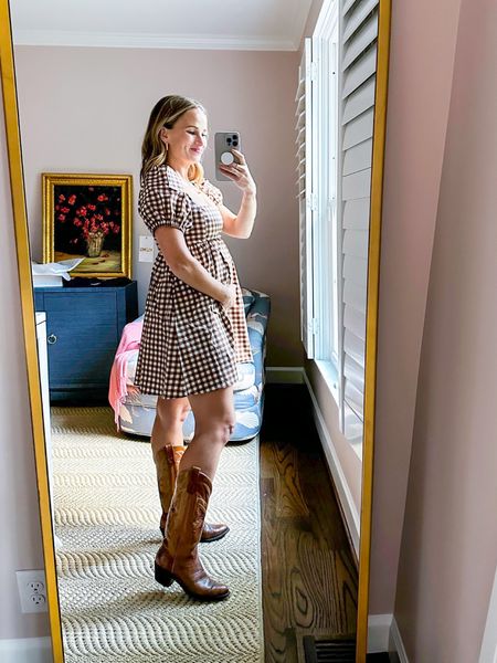 This brown gingham Show Me Your MuMu dress is the perfect option for fall concerts, bonfires, or anything western themed. I’m wearing a size M and I’m 21 weeks pregnant. I’d size up 1 or 2 sizes even not pregnant because I’d say this does run a little small. 

My cowboy boots are old family boots, but I linked two similar pairs from Ariat. #western #countryconcert #fallconcert
