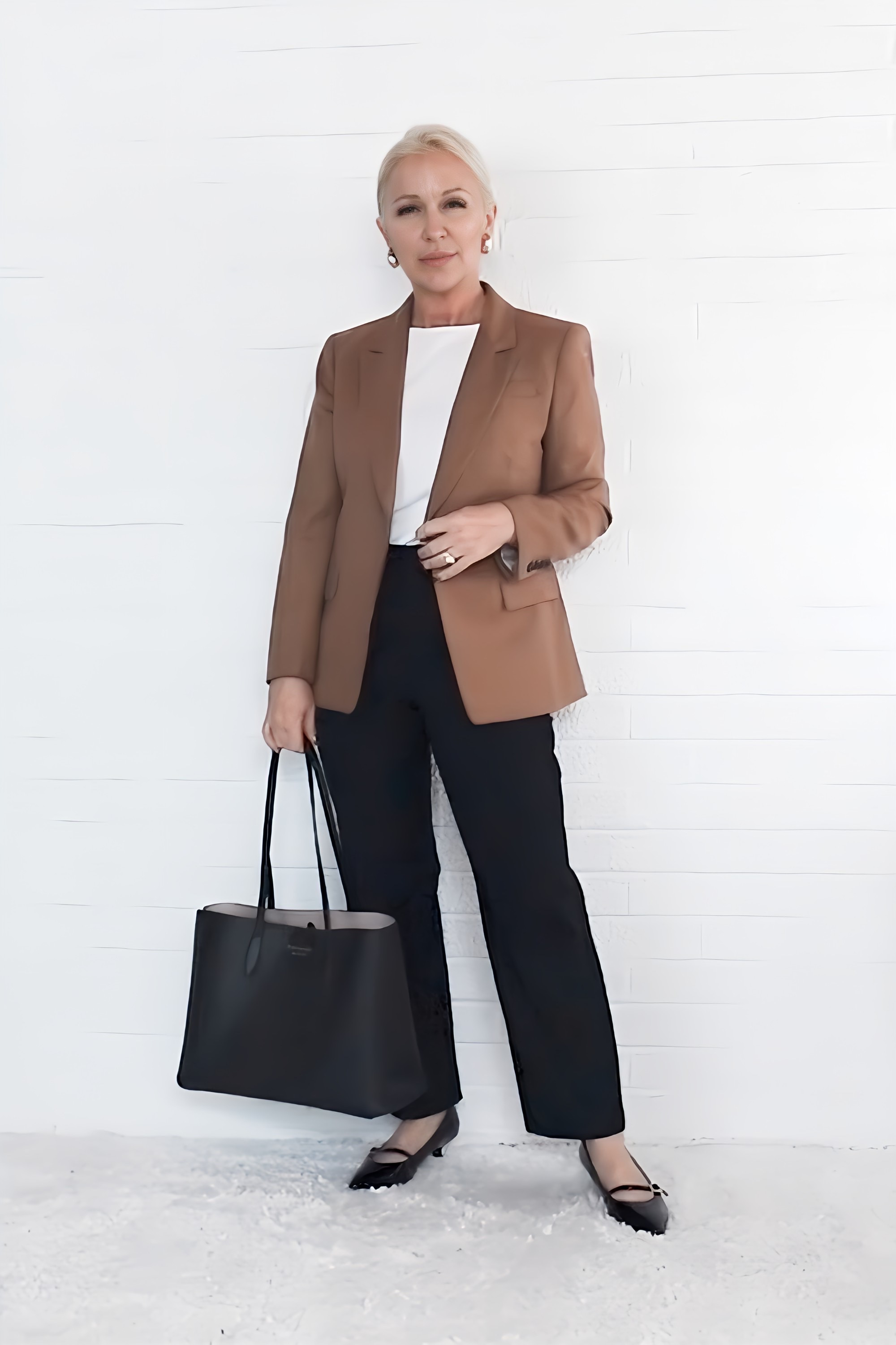 Well, I am required to wear a blazer for my work as a lawyer, I always wear a sleeveless tank underneath my blazer for when those hot flashes hit. Here I have paired a camel blazer with black trousers and a white tank as an example of the three color rule: light median, and dark colors paired together to create dimension and interest in an outfit

#LTKShoeCrush #LTKOver40 #LTKWorkwear