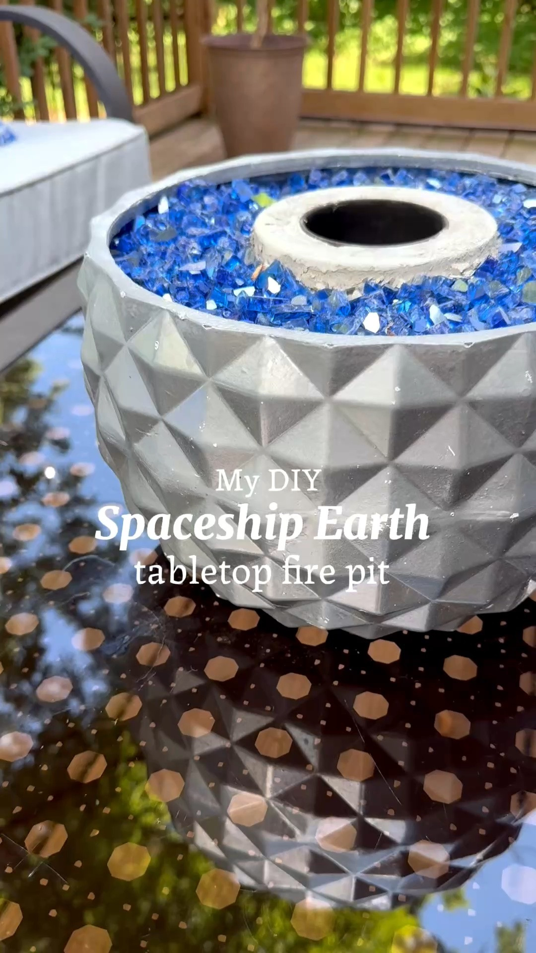 Disney’s Spaceship Earth has come to life as a tabletop fire pit! I spray painted  a geometric planter, added the fire pit insert from Amazon, and then surrounded it with sand and topped it with blue glass chips.

#LTKOver40 #LTKHome #LTKSeasonal