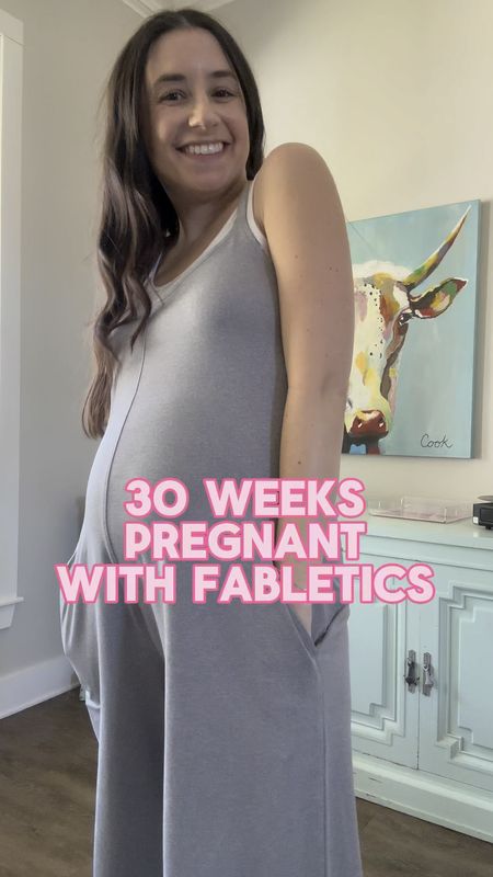 30 weeks pregnant wearing Fabletics! I love this cloud jersey jumpsuit. The wide leg design is so chic and the pockets are a fabulous feature! 

#LTKbump
