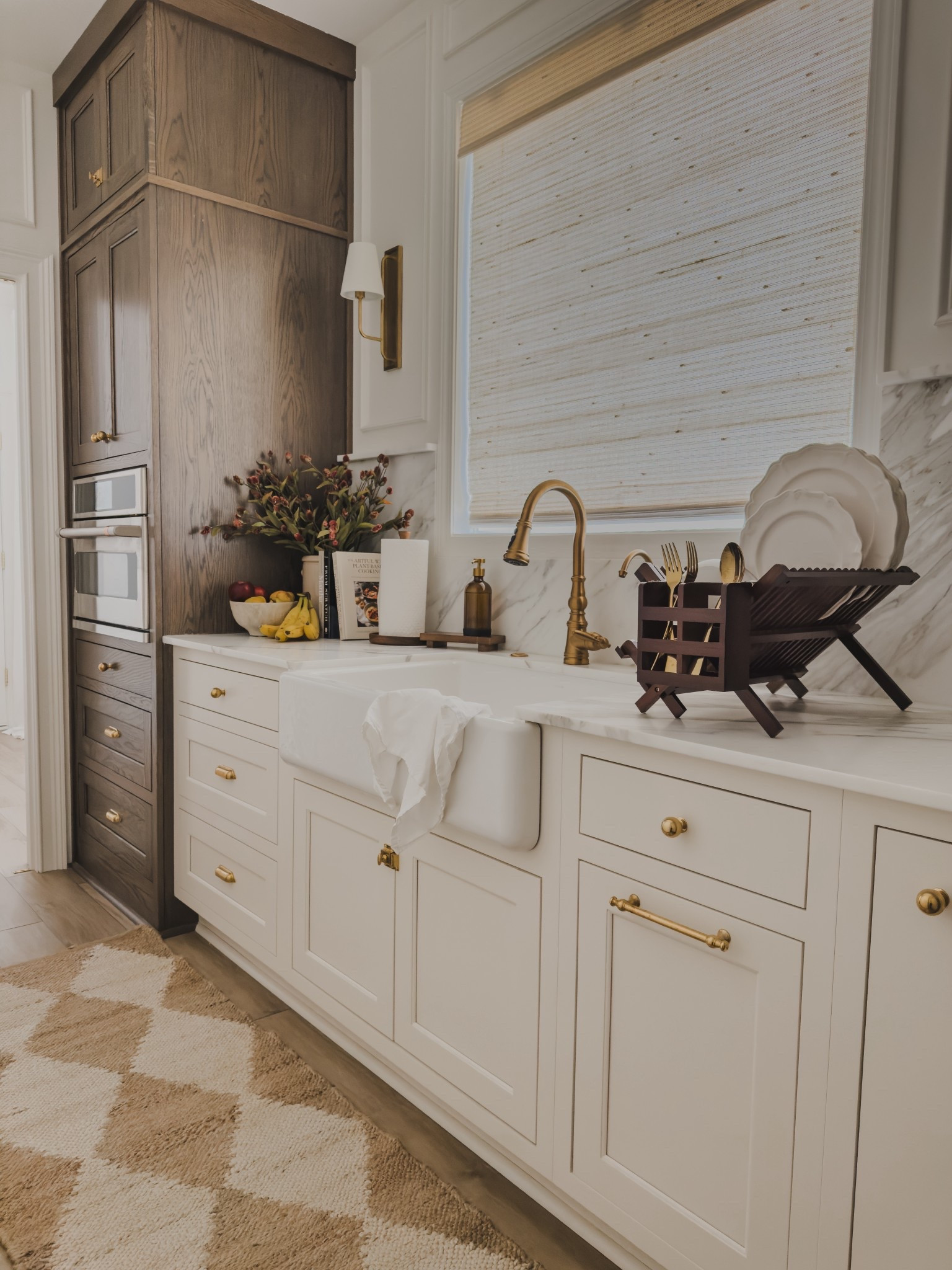 Sharing one of my favorite prep kitchen essentials from @wayfair that has effortlessly elevated my space — my brush gold single faucet. It instantly gives vintage style, luxe vibes without breaking the bank. With a pull down spray it is as aesthetic as it is functional, easily giving a great impact for a refined space. Find this and all of my kitchen favorites to create a great impact to your space.

#Wayfair #WayfairPartner #ad 

Home finds, neutral home inspo, timeless kitchen details, kitchen refresh, Wayfair, gold faucet, DIY upgrades, brass detail, neutral tile inspo, lighting detail, neutral kitchen, spring refresh, farmhouse style sink, Wayfair partner, shop the look!

#LTKSeasonal #LTKHome