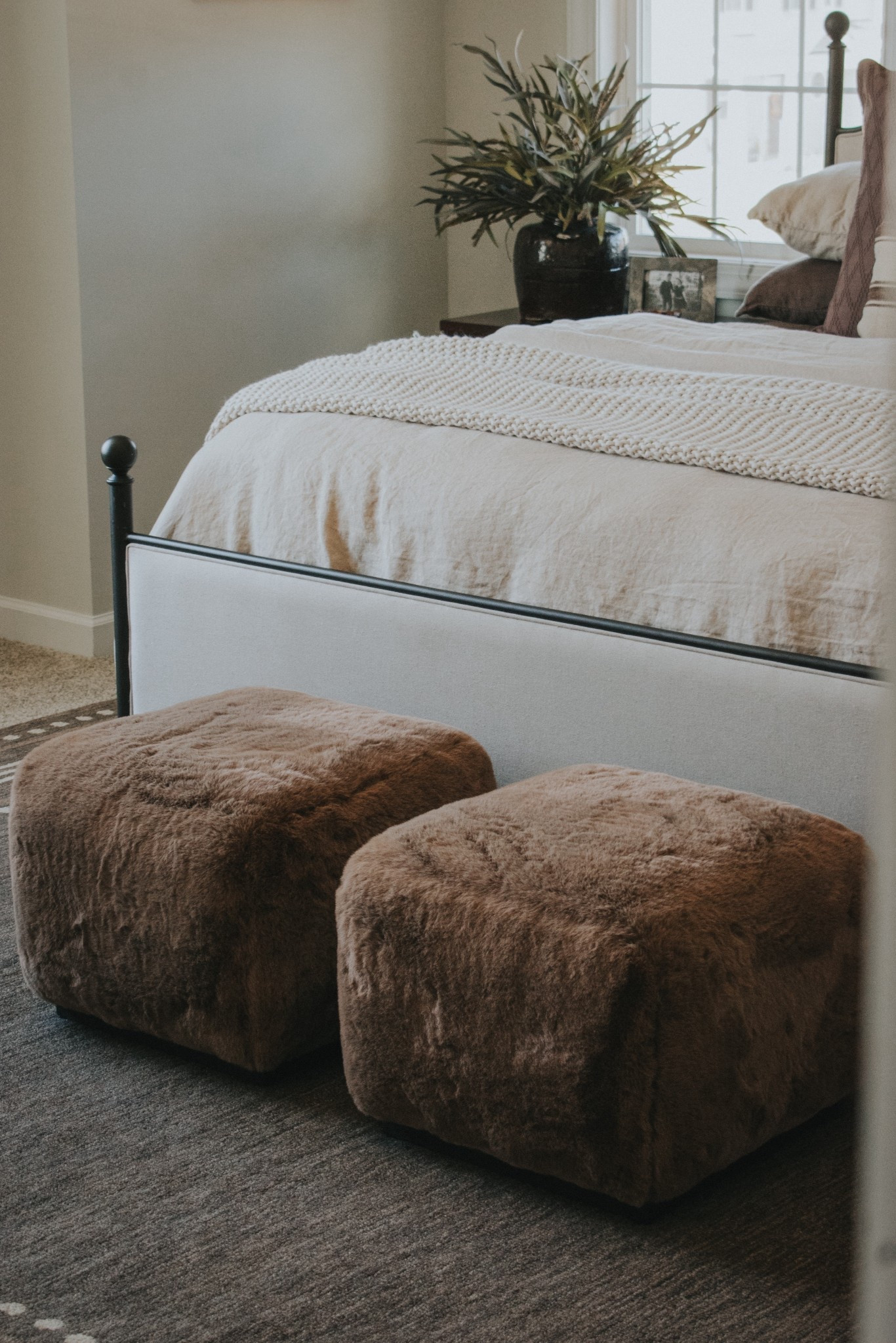 Fur ottomans. Elevated and cozy. Primary bedroom. Organic modern. Elevated chic. Layered interiors. Neutral home  

#LTKHome #LTKStyleTip #LTKSeasonal