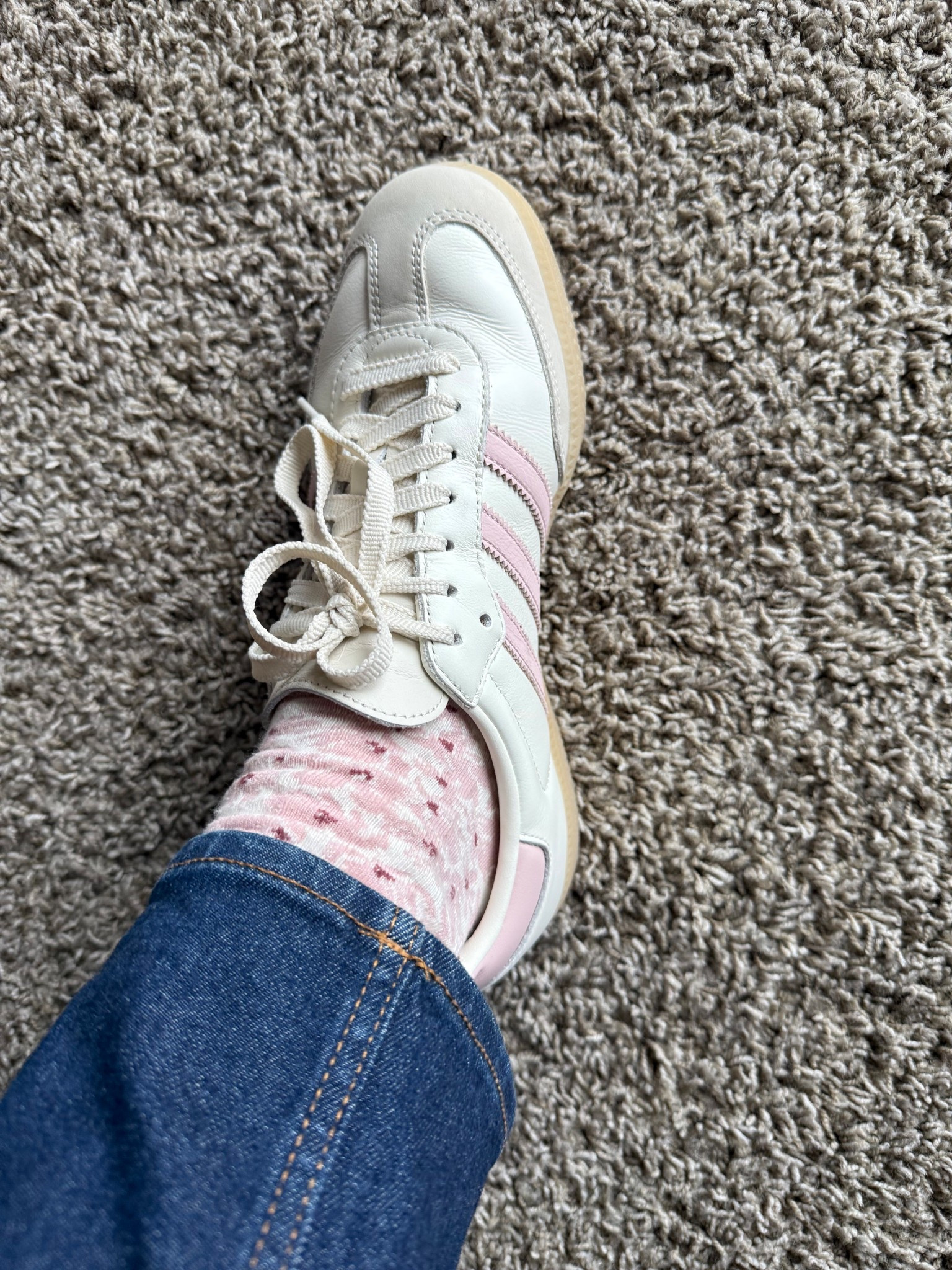 I’m in love with this sock & sneaker combination for colder sprig days!

Organic cotton socks & leather sneakers keep my feet comfortable and warm but not too warm. 

Follow the sneaker size guide for the sneakers as it’s not standard US sizing. They fit true to size. 