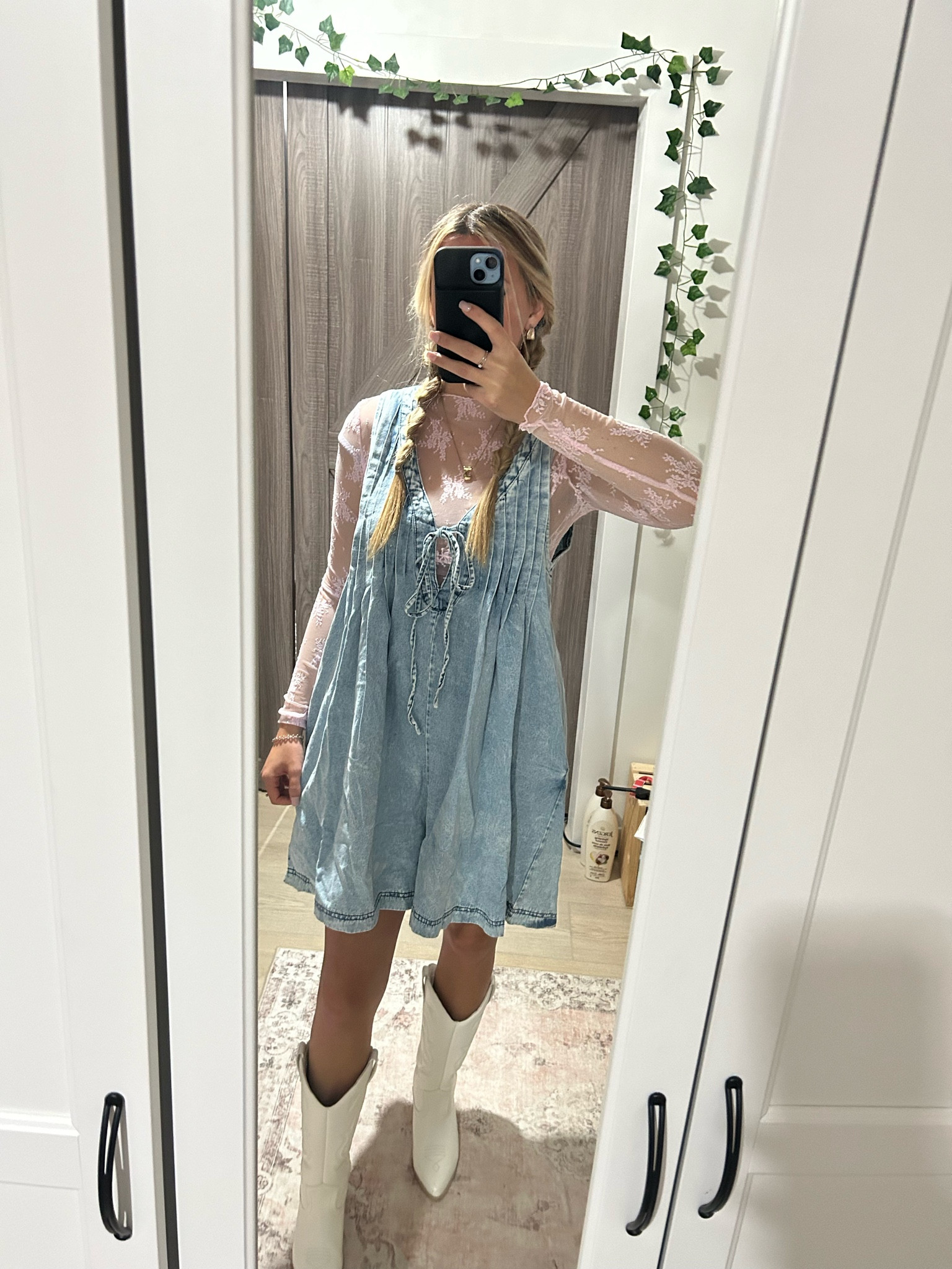 Denim romper over long sleeve mesh top for the perfect western look. Great for a fall country concert.