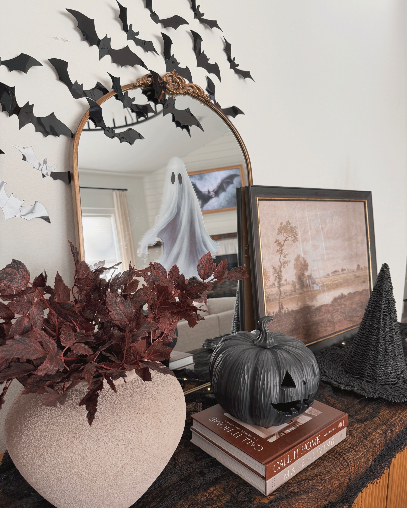 Couldn’t find the viral Martha Stewart ghost mirror? Make your own with a window decal and picture spotlight! 👻

#LTKHome #LTKHalloween #LTKFindsUnder50