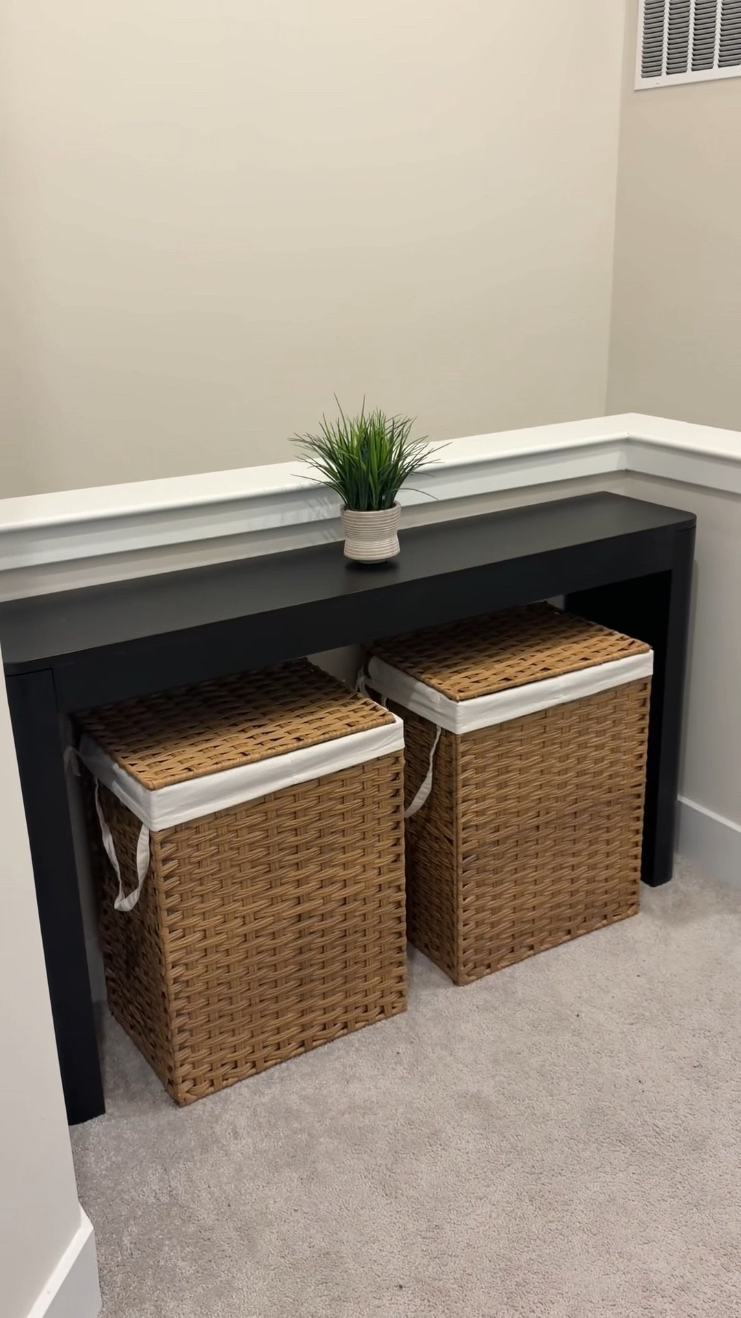 Turned this awkward space at the top of our stairs into something purposeful. This is right across from our laundry closet, so the table can be used for folding clothes too.

#beforeandafter #laundry #homedecor 

#LTKHome #LTKFindsUnder50