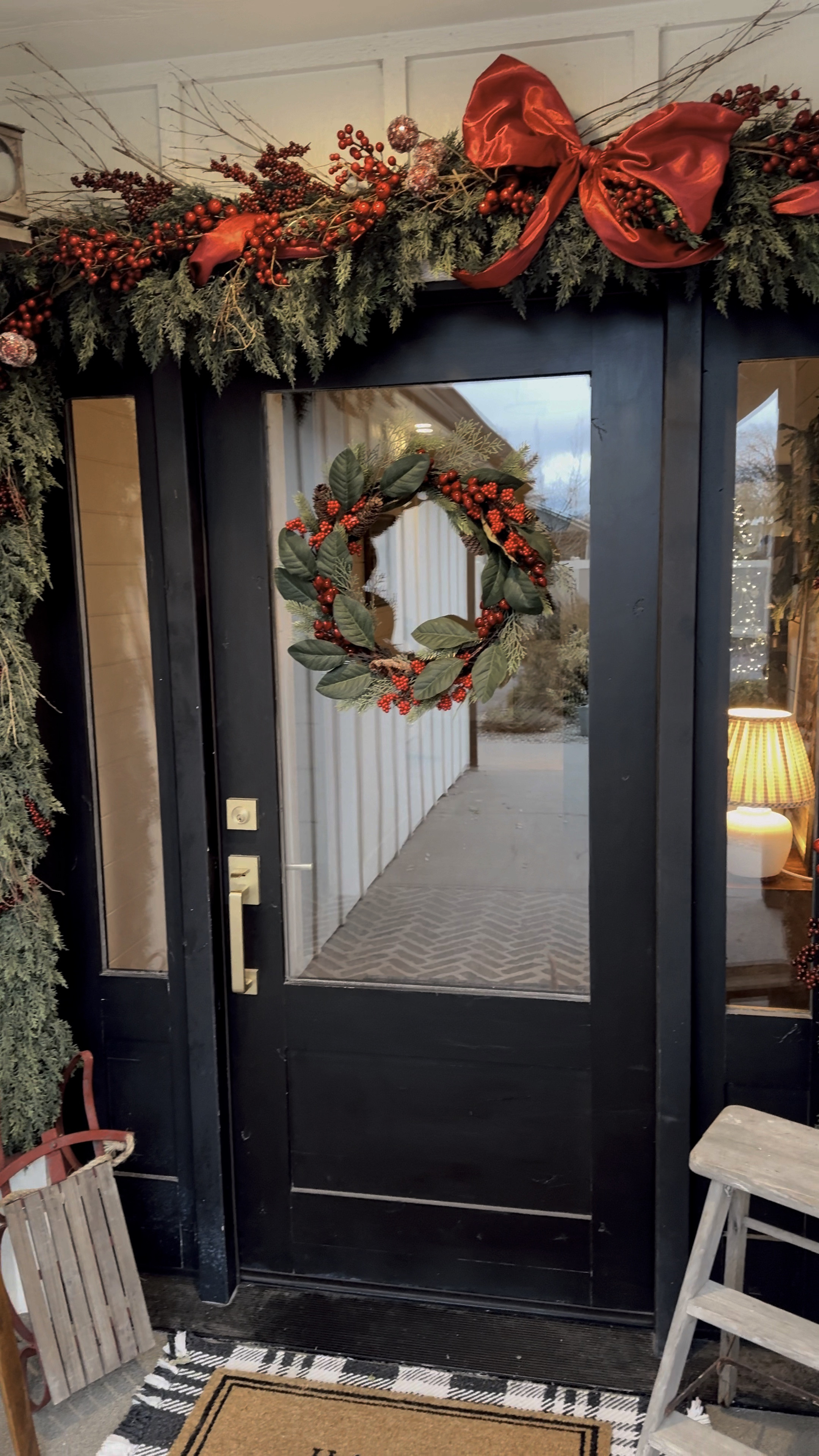 Starting to dress up my entry way for the holidays. Here is what I used:
2 berry garlands, 3 cedar garlands, 1 bow, twigs and berry picks. 
Minus bauble garland.

#LTKHome #LTKSeasonal #LTKHoliday