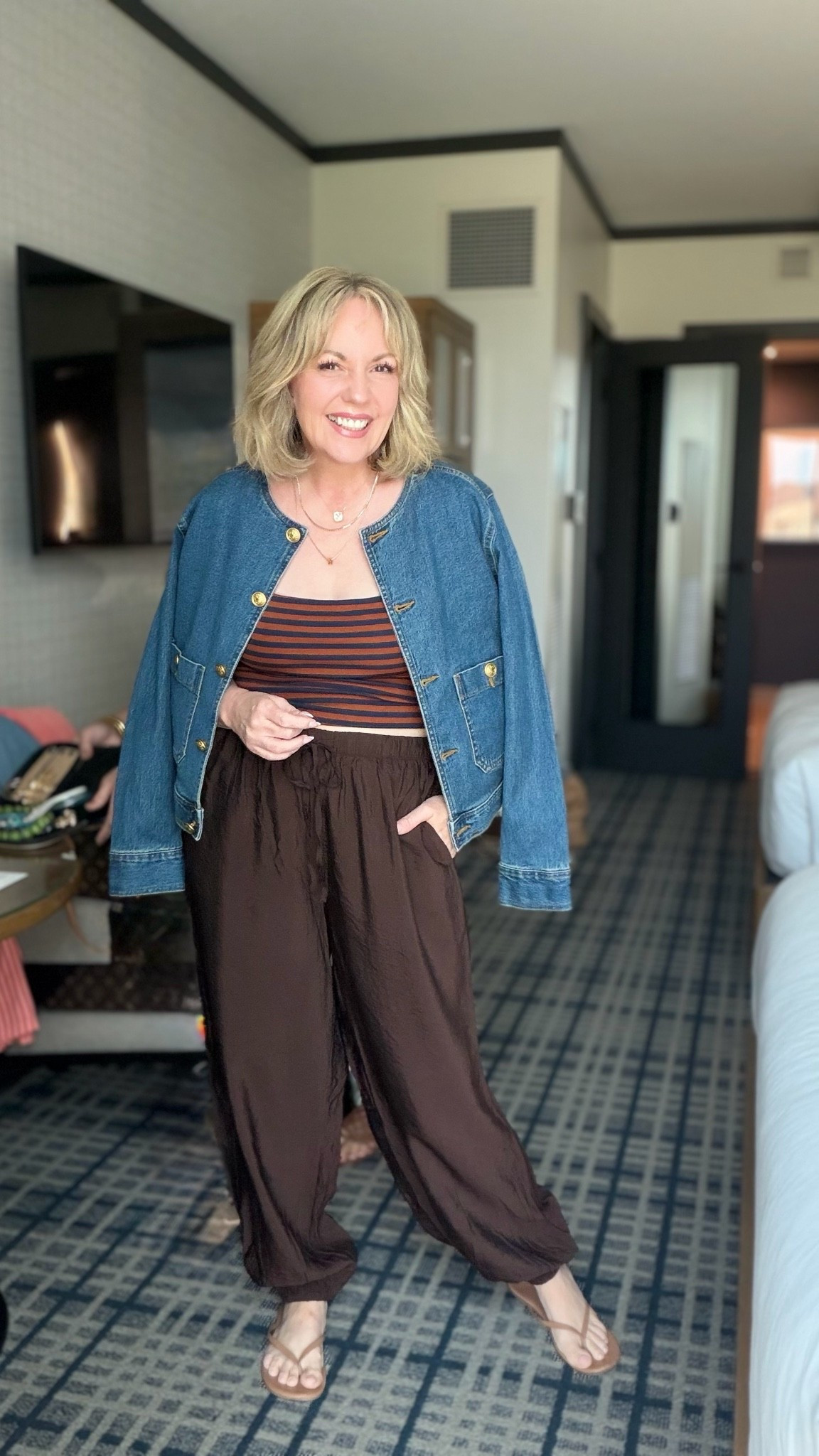 Medium tank and pants; small jacket

#LTKCon #LTKOver40 #LTKPetite