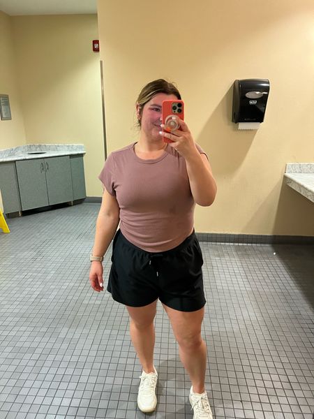 Workout fit of the day! All old navy and affordable. Shorts I sized up to an XL for a bit of length. These do not have any built in under things. Top is size large! Wearing my fav lululemon training shoes. 

#LTKcurves #LTKunder50 #LTKfit