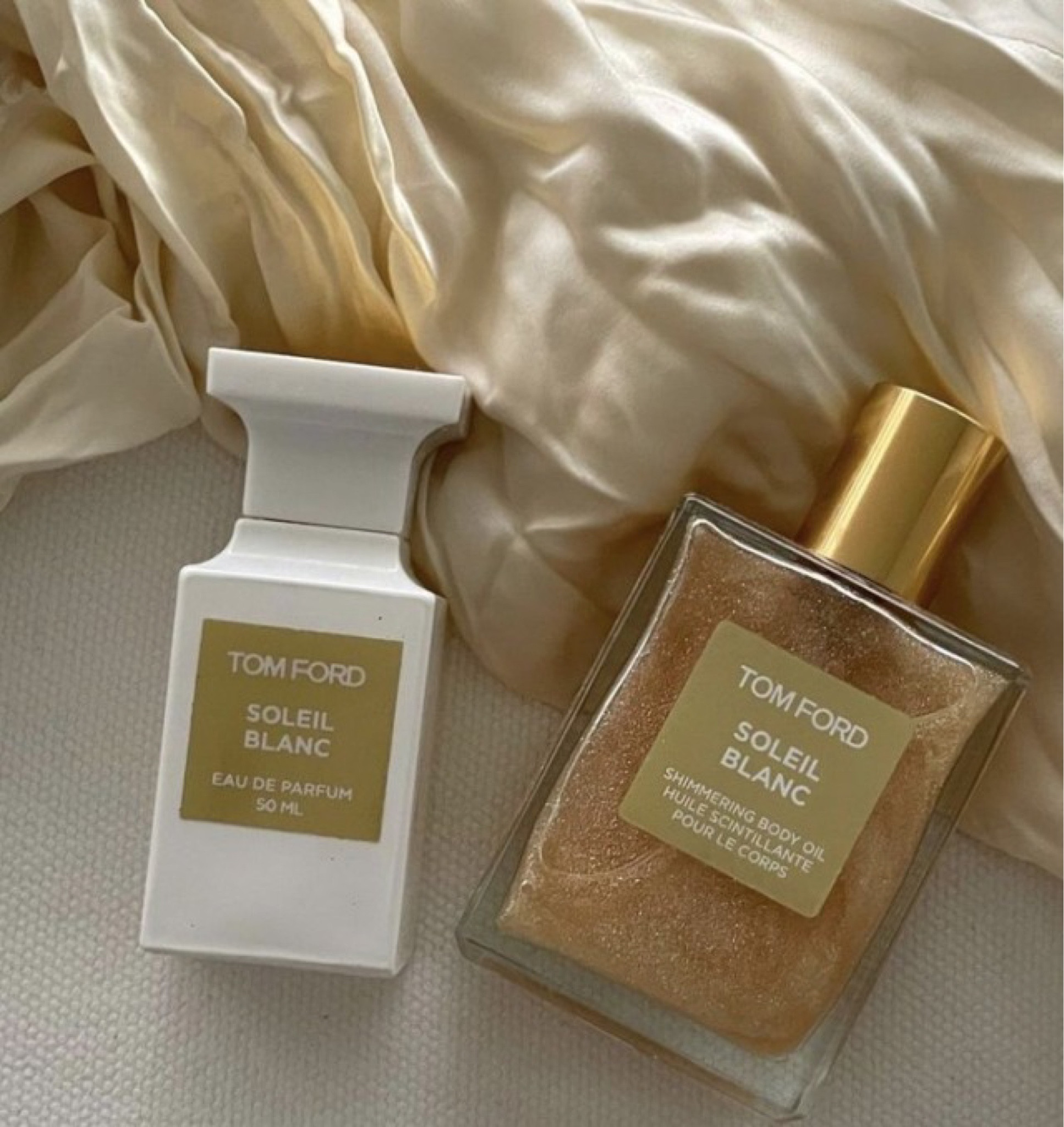 Tom ford soleil blanc perfume and glitter body oil. This stuff smells so good and makes you shimmer pretty. It girl aesthetic item. 

#LTKunder50 #LTKSeasonal #LTKbeauty
