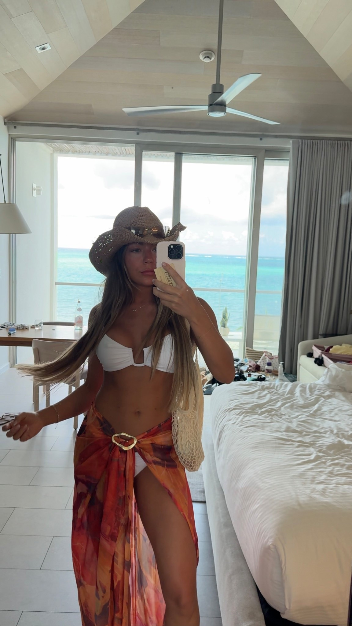 Revolve is sold out of this exact hat, but I got the mazy cowboy hat from florabella in the color burl

Wearing a size small and top and bikini bottoms and a M/L in the sarong, but it is adjustable 🫶🏼