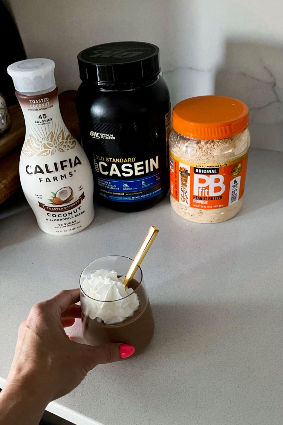 Protein packed dessert! 
Protein powder, peanut butter powder, coconut-almond milk, a dollop of whipped cream! 
Recipe:
I scoop protein powder + 2 TBSP PB powder + 8oz coconut-almond milk
BLEND and refrigerate! 
Add a dollop of whipped cream 


#LTKfit #LTKSeasonal #LTKunder50