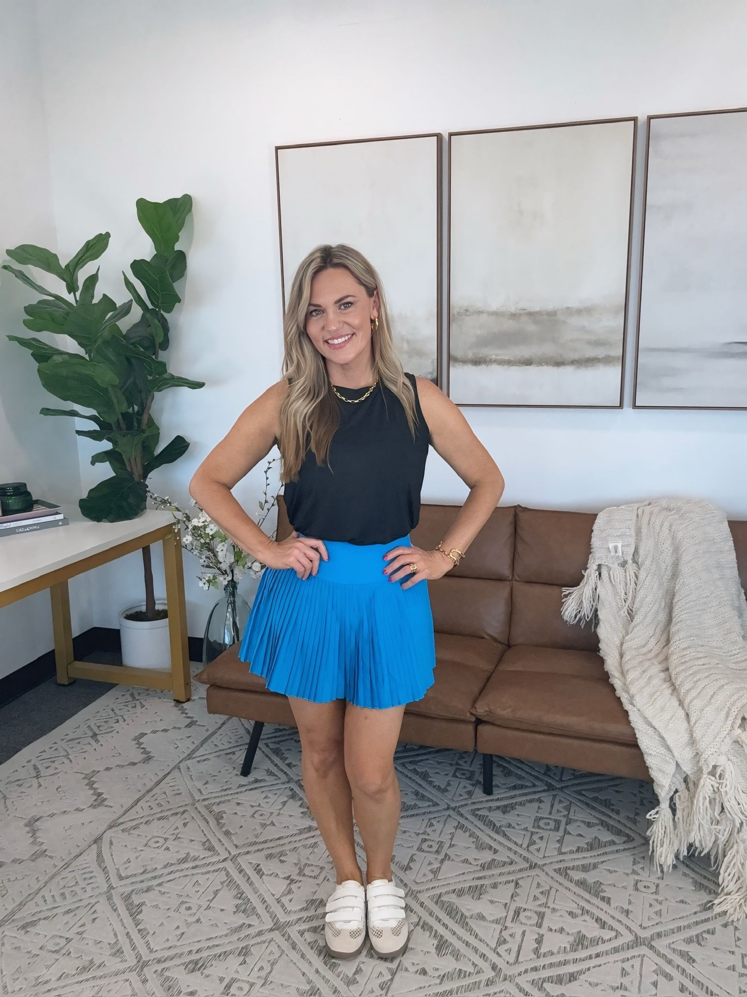 This pleated skort is such a fun pop of color for spring and makes any outfit feel instantly put together. I love it paired with a simple black tank for an easy sporty chic look that works for everything from pickleball to errands.

Wearing size small top, medium skits, and 7.5 shoes

spring skort outfit, pleated skort women, pickleball outfit, tennis outfit women, sporty chic style, casual spring outfit, amazon fashion finds, athleisure outfit ideas, colorful spring outfit, everyday activewear look, audriedollins

#LTKOver40 #LTKActive #LTKootd