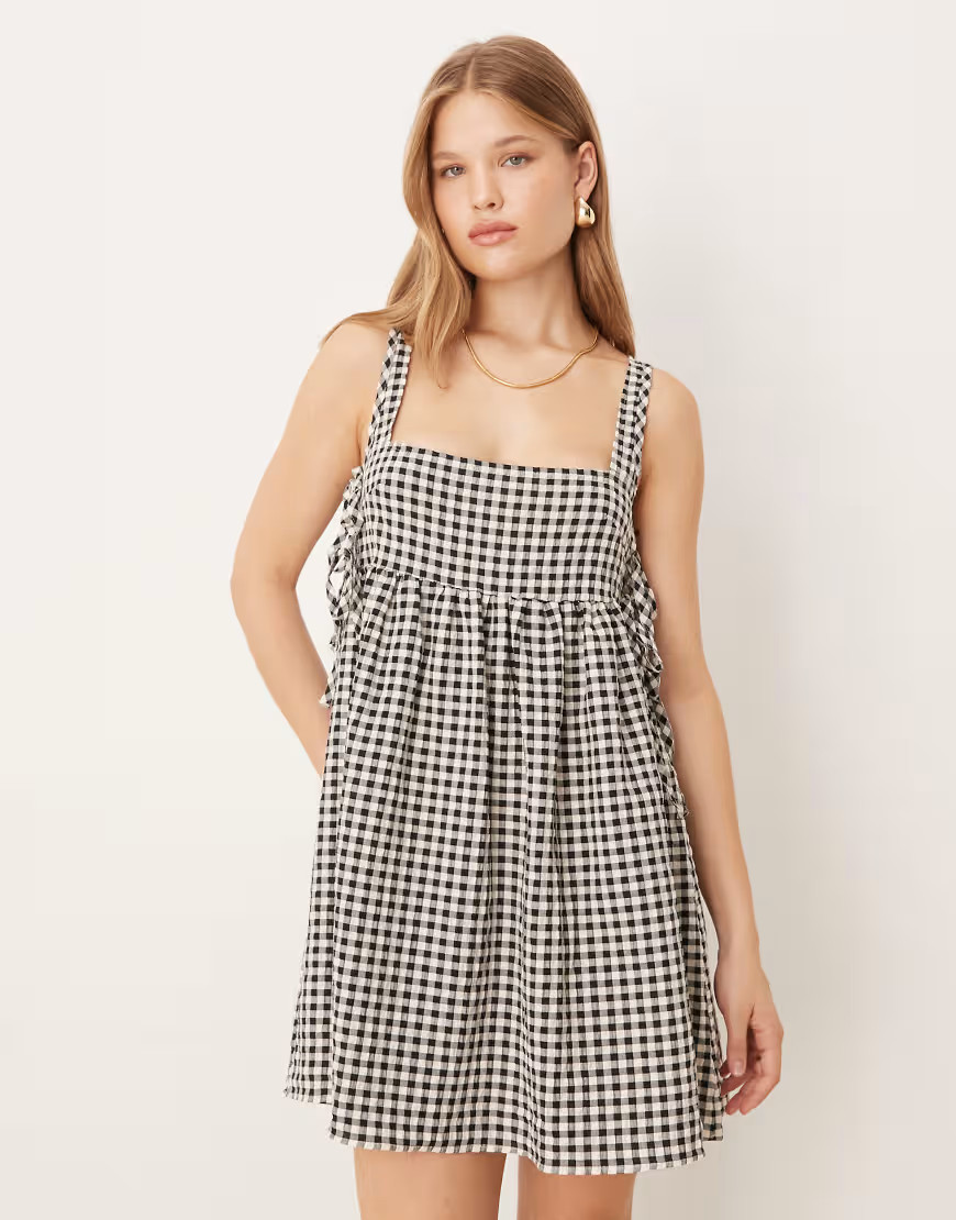 ASOS DESIGN tie side baby doll mini dress in black gingham-Multi | ASOS (Global)