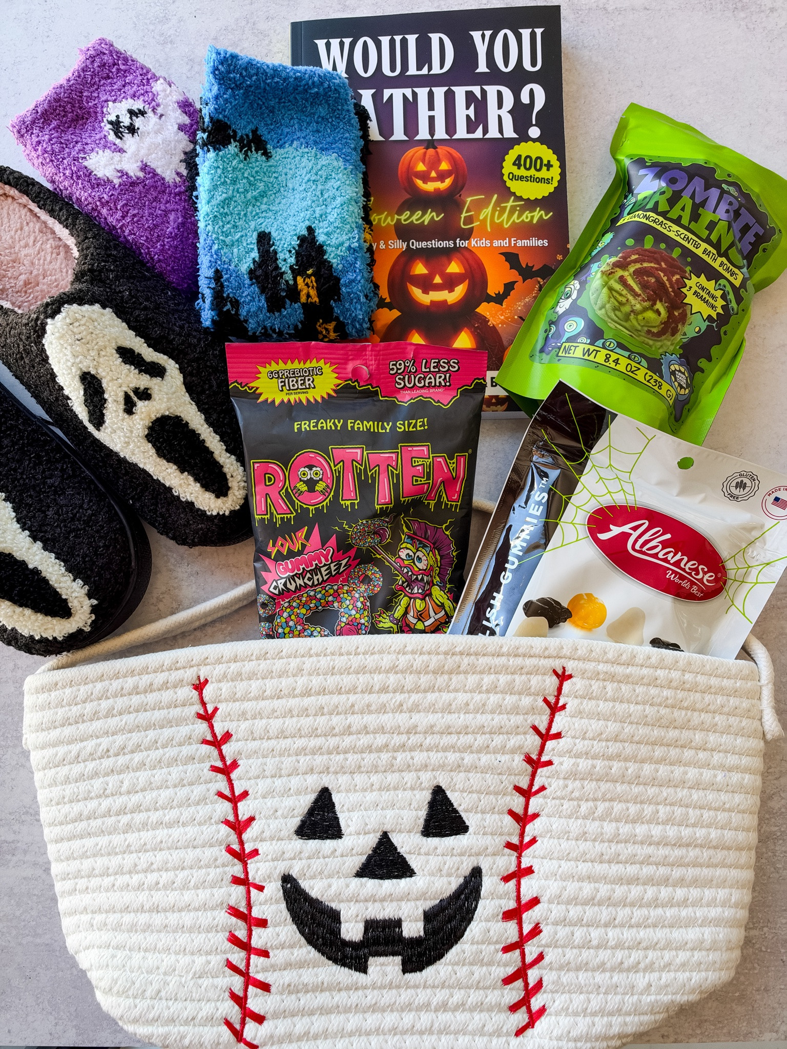 Putting together Halloween boo baskets and found SO many fun things this year! 👻 Candy, cozy socks, bath bombs and a Halloween game make such an easy basket for kids and teens.

#LTKmomlife #LTKSeasonal #LTKKids