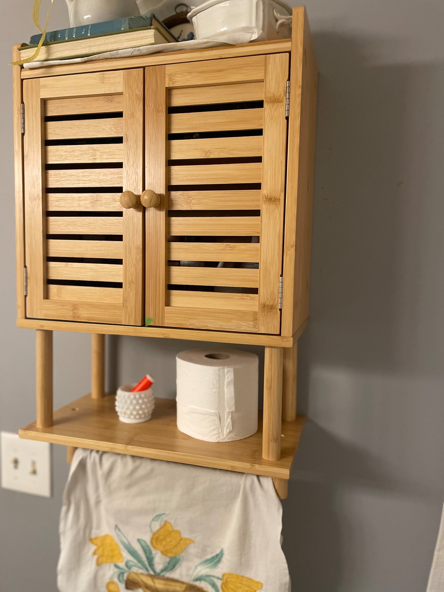 Looking for a relatively inexpensive but quality wall cabinet? This is it! Perfect for a powder bath or kitchen, it can hold all of your essentials behind these pretty slatted doors!

#LTKHome #LTKFindsUnder100