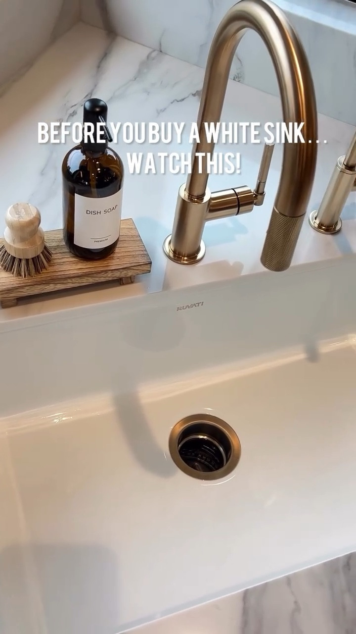 Not all white sinks are created equal!! There are so many made with different materials is what I learned when we started renovating our kitchen. I really wanted a white kitchen sink because I don’t like the look of stainless steel with a gold faucet. After EXTENSIVE research, I ultimately decided on a white fireclay sink. Here’s why:

1. They are stain resistant. Unlike other white sinks made from other materials, fireclay sinks don’t stain easily because they are not porous. I say, “most part” because for example, tomato sauce for hours in the sink can possibly stain it, but it is going to come out with the right products. 

2. Since they are non-porous and smooth, they are also resistant to bacteria and germs. Big plus!!!

3. Fireclay is highly heat resistant – boiling water, hot pots and pans can be placed straight into the cold sink with no fear of cracking or damage.

4. It’s hard to break or nick a fireclay sink.

5. They can withstand harsh chemicals. I like to bleach inside my sink after I’ve handled meats, especially chicken.

They are overall very easy to maintain and that’s a win in my book. 

Ways to shop my home:
1. Link in bio
2. Comment SHOP and I’ll send you the direct link (must be a follower for link to come through)

#fireclaysink #fireclay #kitchensink #undermountsink #whitekitchensink #kitchenremodel #kitchendesign #kitchendesignideas #homedesign #whitesink #homerenovation #renovation #goldfaucet