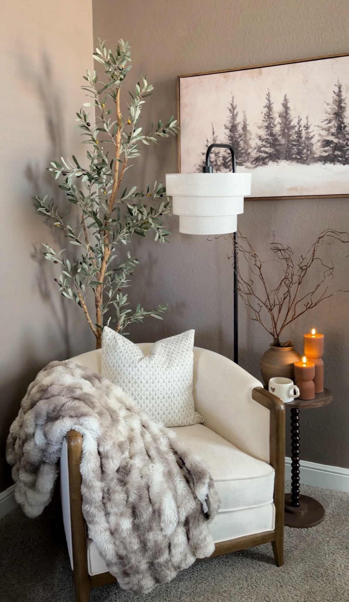 Cozy bedroom corner, faux fur throw, throw pillow covers, comfy chair, accent chair, accent table, battery candles, olive tree 

#LTKHome #LTKFindsUnder50 #LTKSeasonal