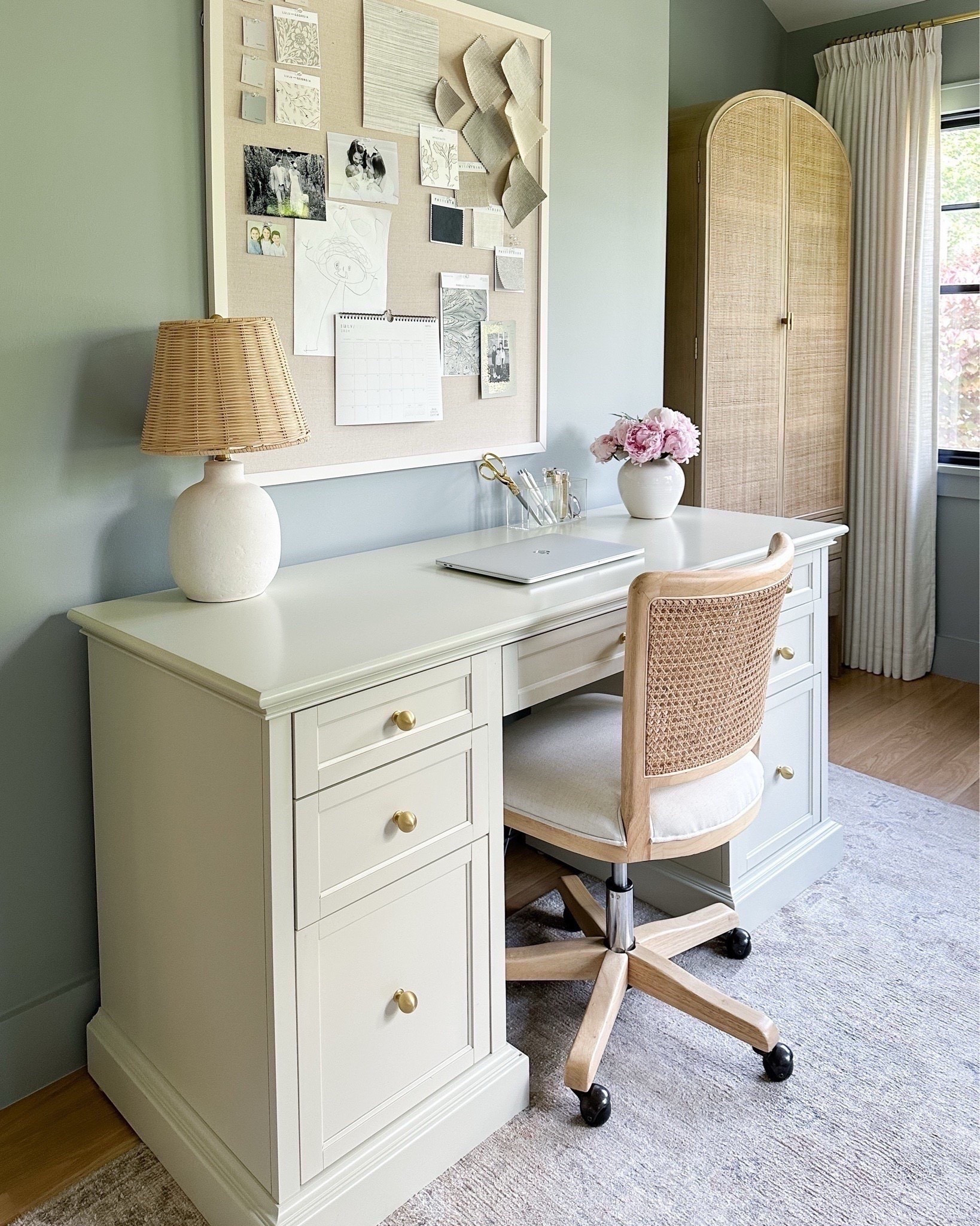 Home office views! I switched the knobs out on my off-white executive desk from Home Depot. I love the amount of storage. This has including two file drawers. Paint color is Boothbay gray by Benjamin Moore.

#LTKFindsUnder100 #LTKHome #LTKStyleTip