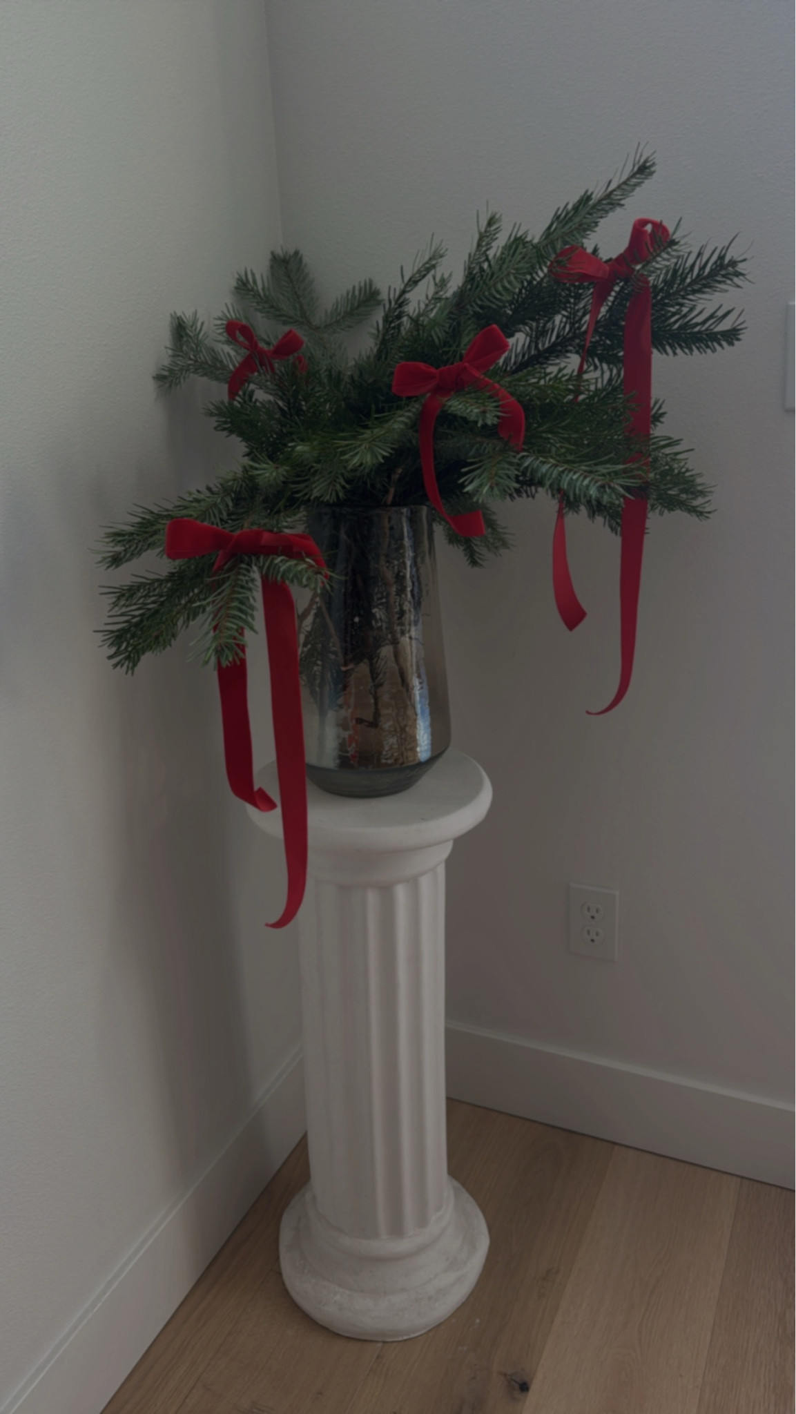 Bringing a touch of holiday cheer with fresh greenery and festive red bows! 🌿🎀 This simple yet elegant Christmas decoration is perfect for adding a cozy, seasonal vibe to any space. 

#LTKHome #LTKHoliday #LTKFindsUnder50
