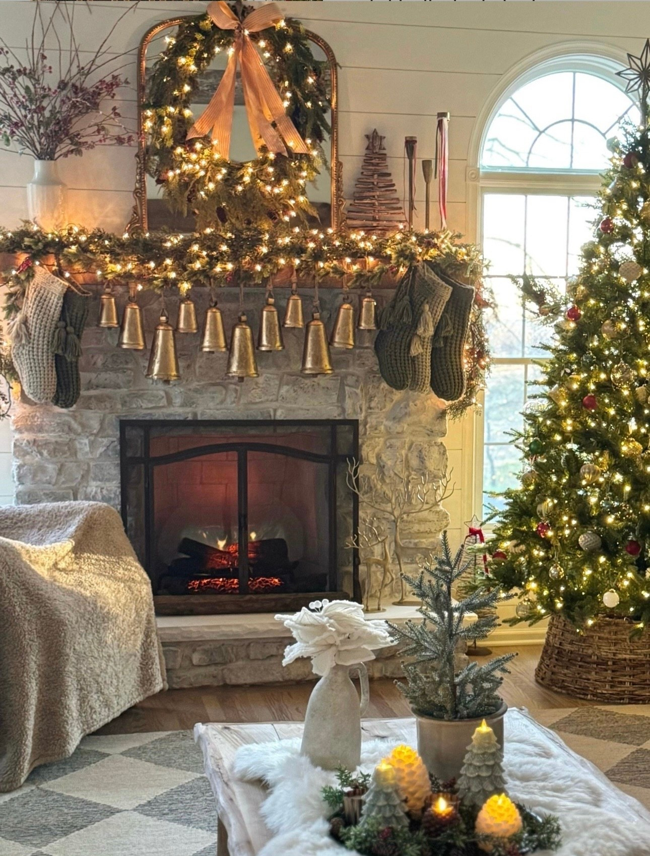 Christmas Decorations: Gorgeous hanging gold metal bells, knit stockings, winter berry stems, table decor, flameless Christmas tree candles, faux fur table throw, faux poinsettias. Gleaming Primrose Mirror; Electric fireplace insert, Beautiful pre-lit Christmas tree  

#LTKSeasonal #LTKHome