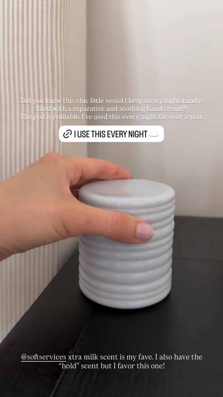Did you know this chic little vessel I keep on my nightstand is filled with a reparative and soothing hand cream?! 
The pod is refillable. I’ve used this every night for over a year.  @softservices xtra milk scent is my fave. I also have the “hold” scent but I favor this one!