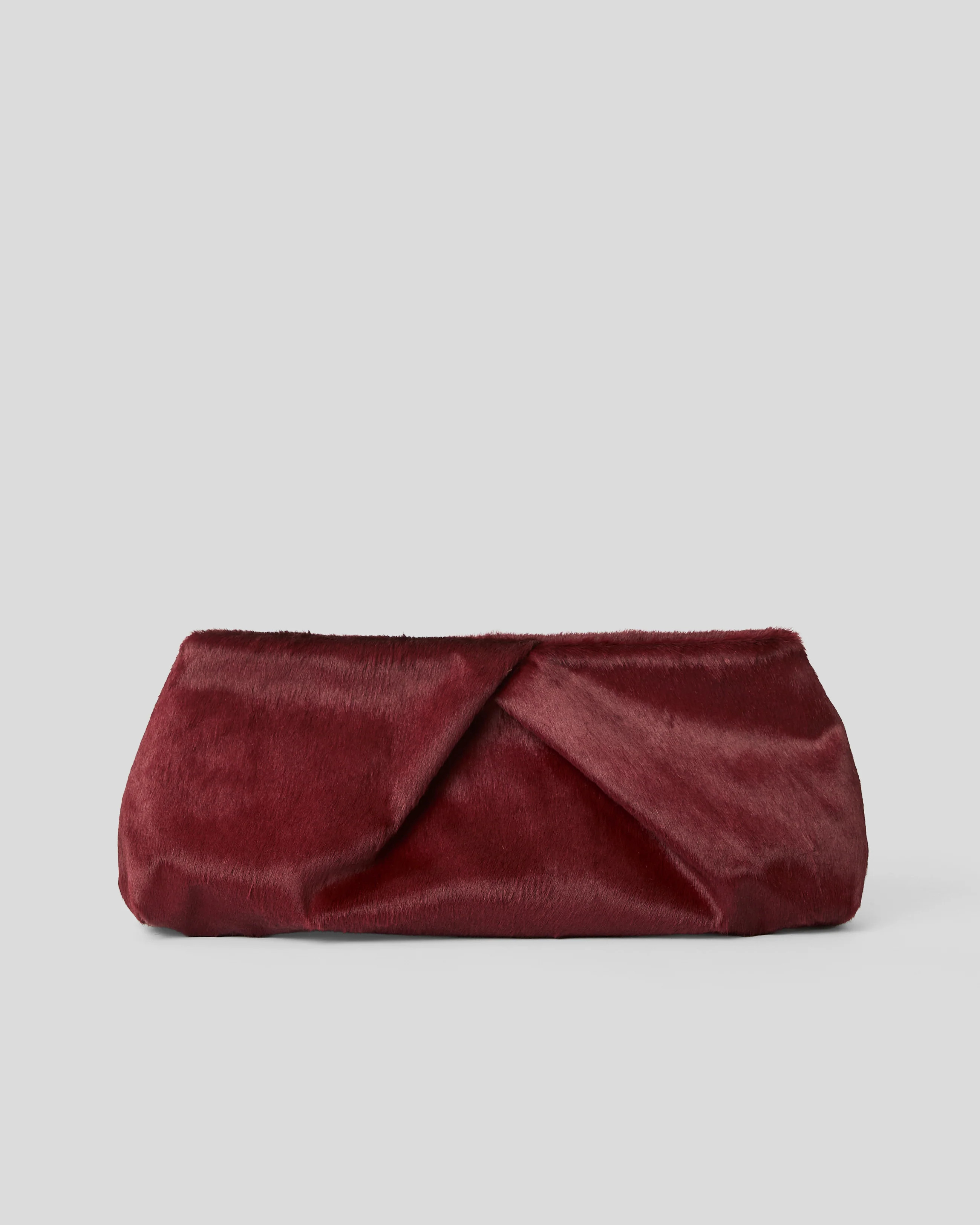 JINO CALF-HAIR CLUTCH | B-Low The Belt