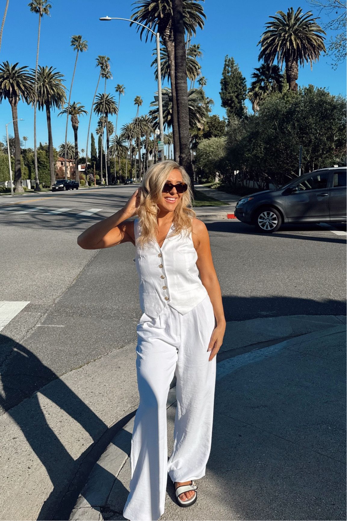 Trousers are on sale, I got the wrong size so little big on me. I have a promo code for the sandals too: CKEMSHEL15 - Abercrombie - Abercrombie and fitch - white trousers - Abercrombie sale - Abercrombie trousers - Abercrombie pants - white pants - tailored pants - tailored trousers - white wide leg pants - white wide legged pants - waistcoat - waist coat - button waistcoat - trousers - white trousers - summer outfit - Abercrombie jeans - Abercrombie and fitch jeans - forever new - celine - celine sunglasses - Charles and Keith promo code 

#LTKworkwear #LTKtravel #LTKshoecrush