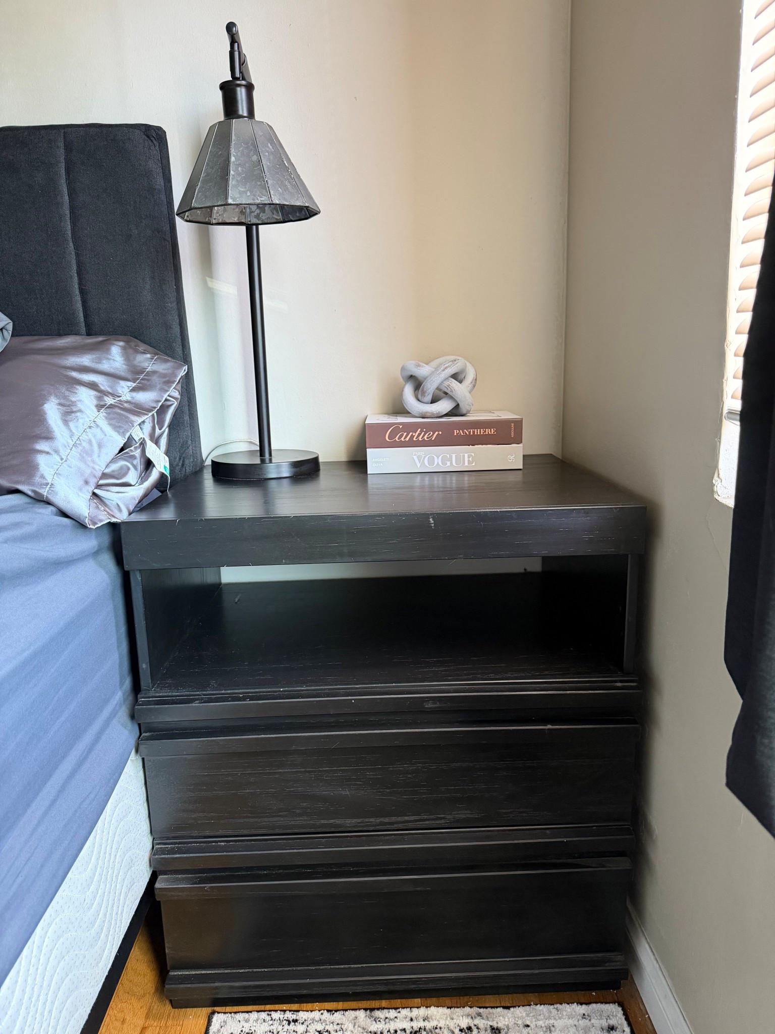 Added a couple decorative items to the night stand

#LTKHome